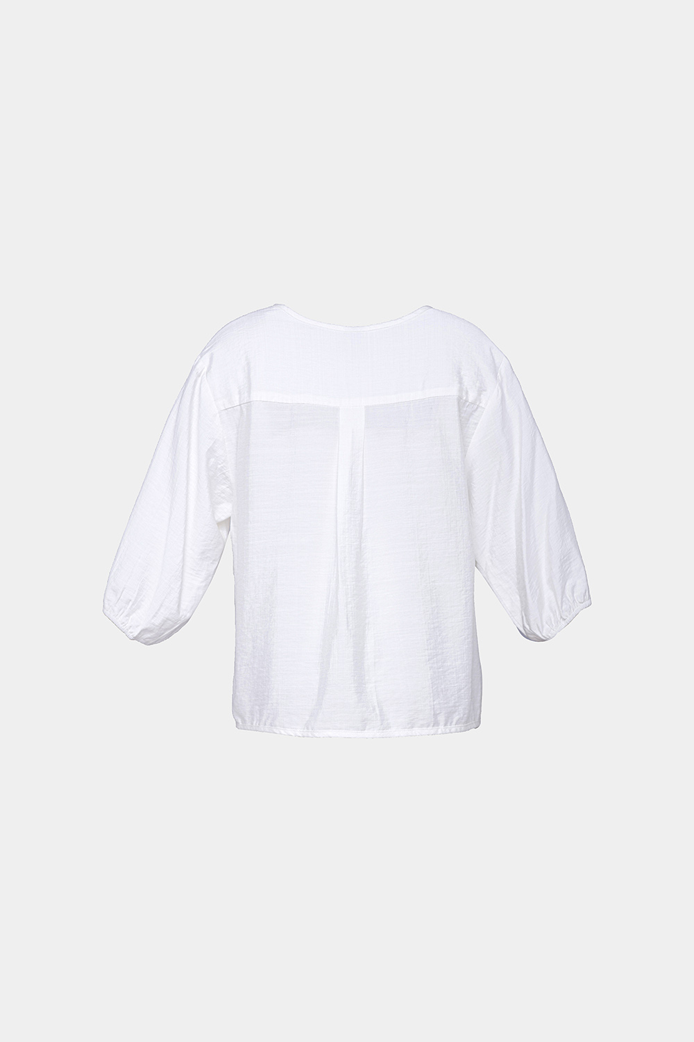 Áo sơ mi trắng cổ tròn tay lỡ 