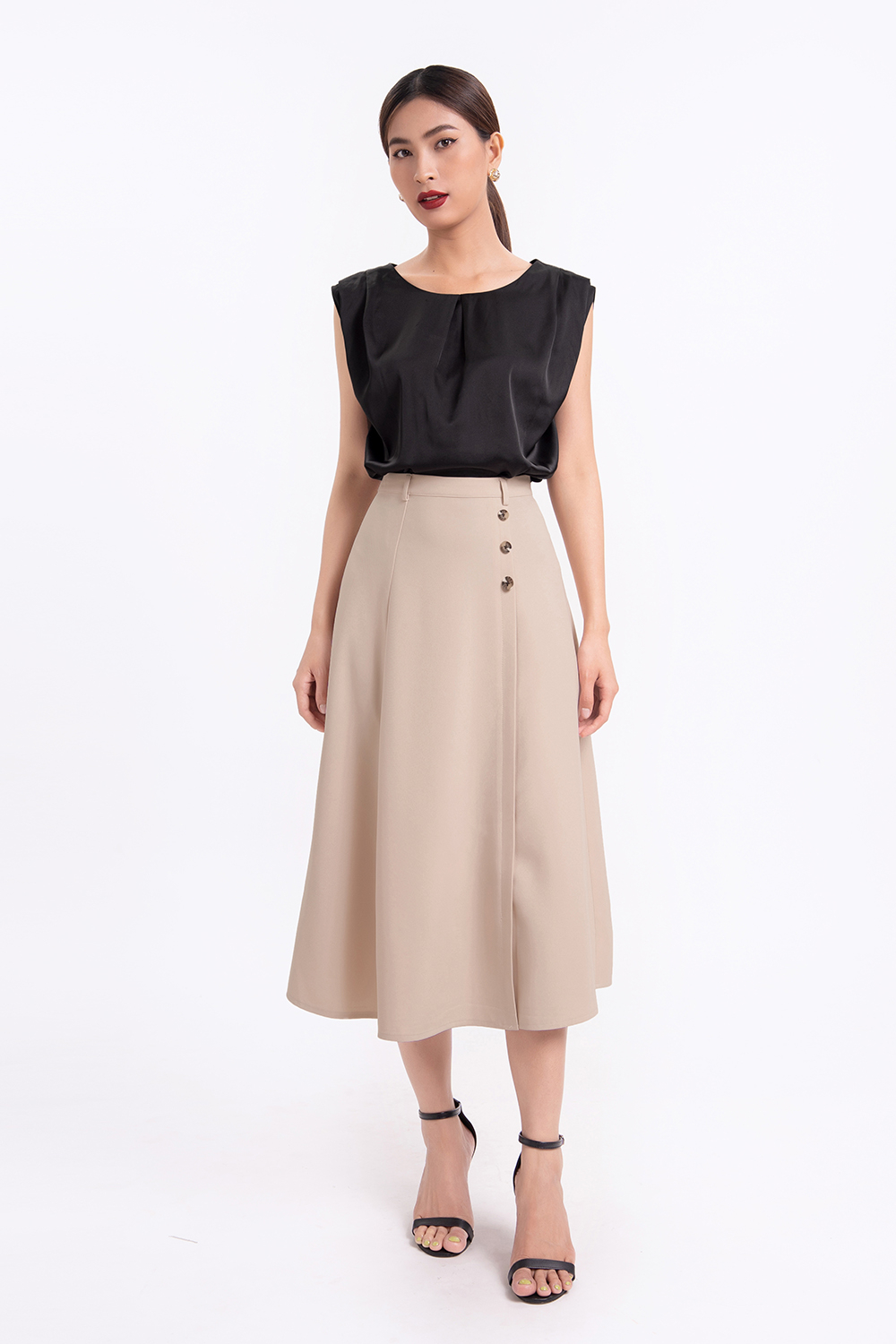 Chân váy midi xòe phối nút 