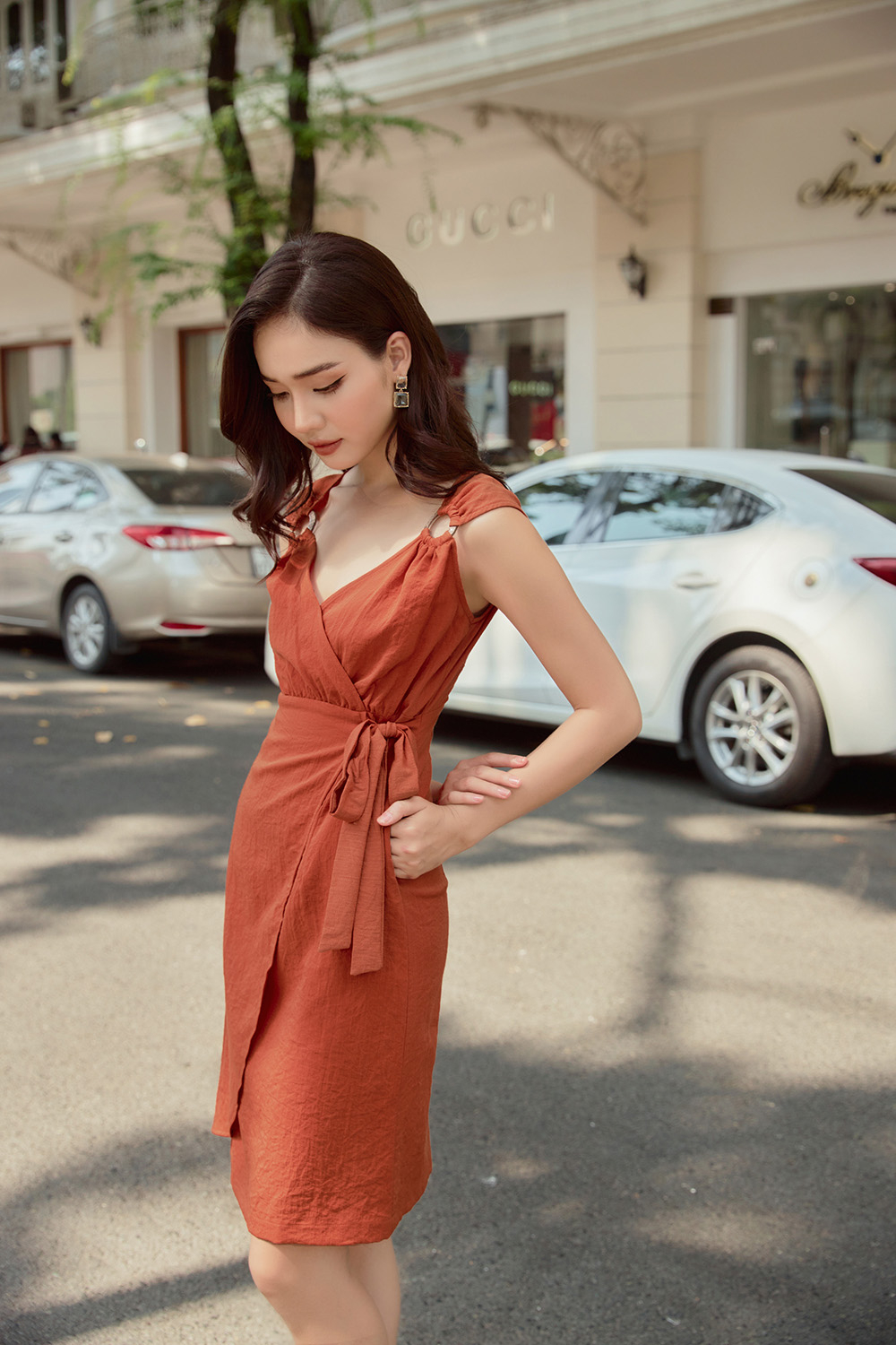 Đầm wrap dress phối khoen vai nơ eo