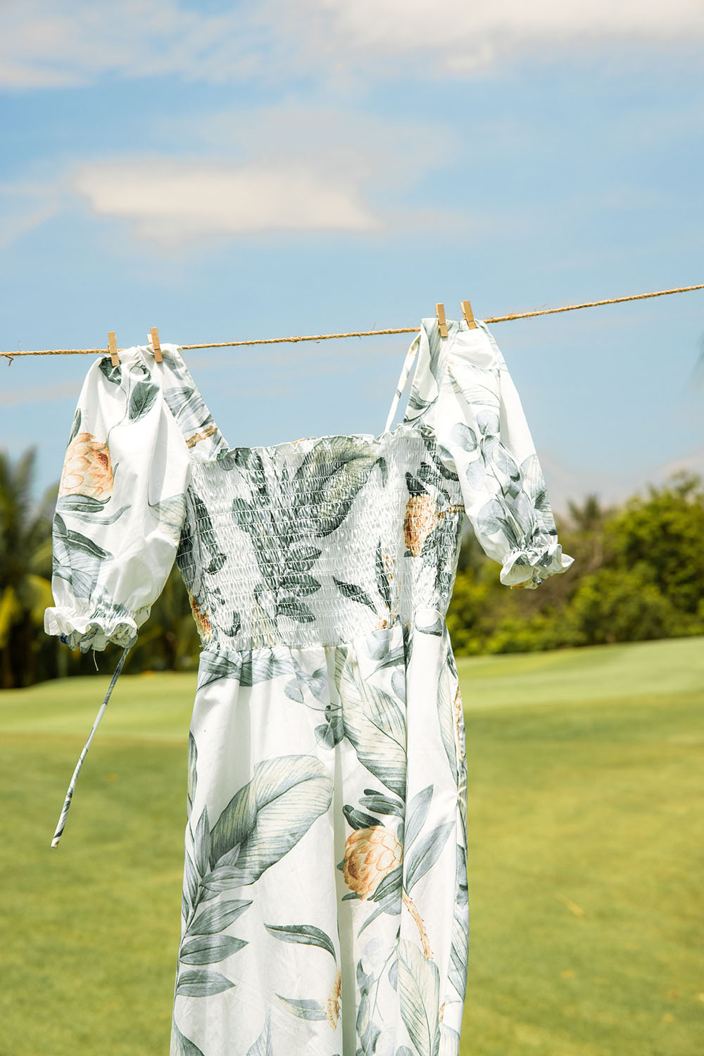 Đầm xòe họa tiết ngực bo chun tay phồng 