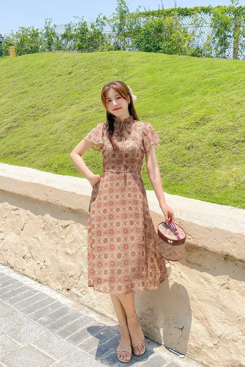 Đầm công sở họa tiết dáng xòe cổ đính nơ 