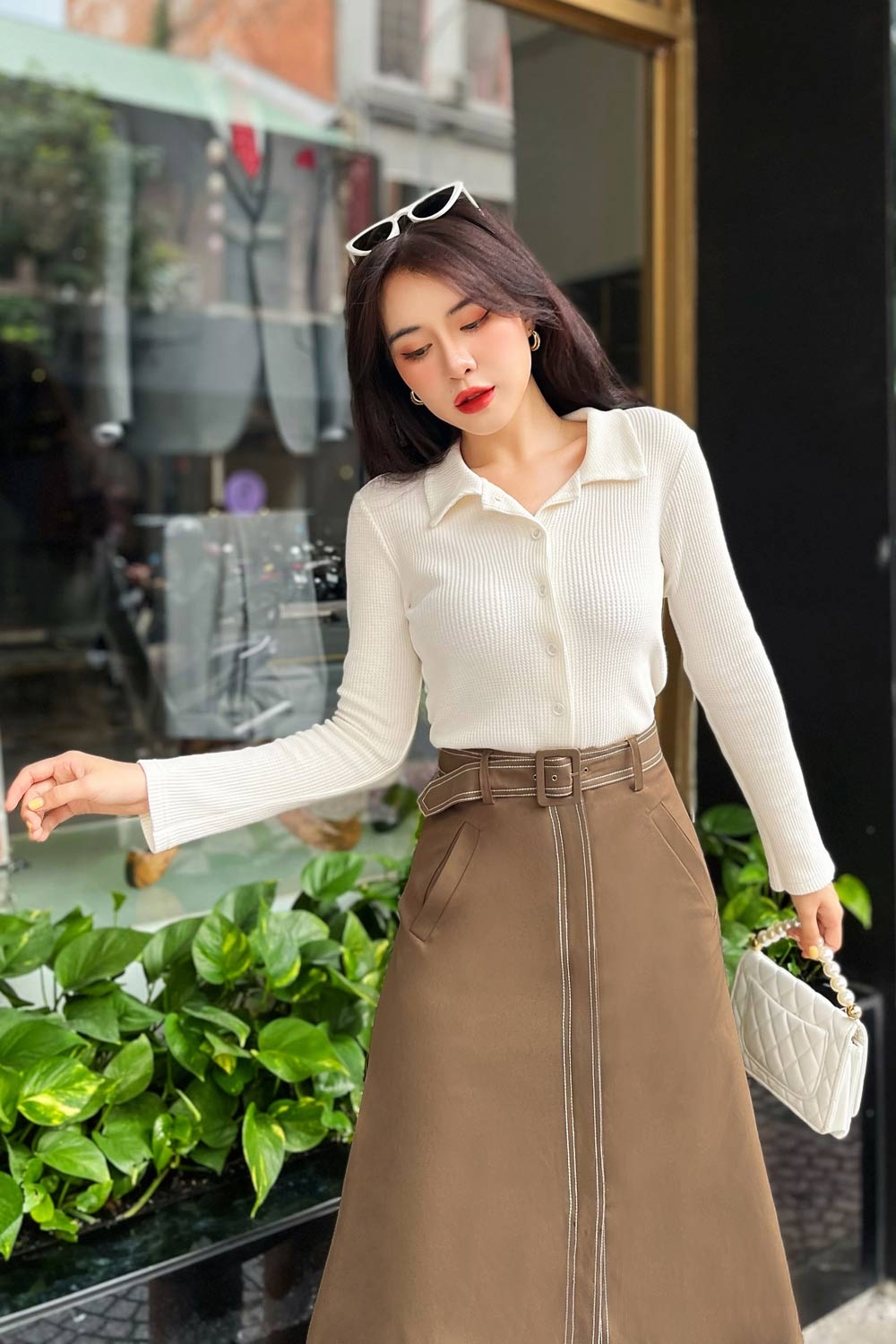 Áo thun ôm tay dài phối nút 