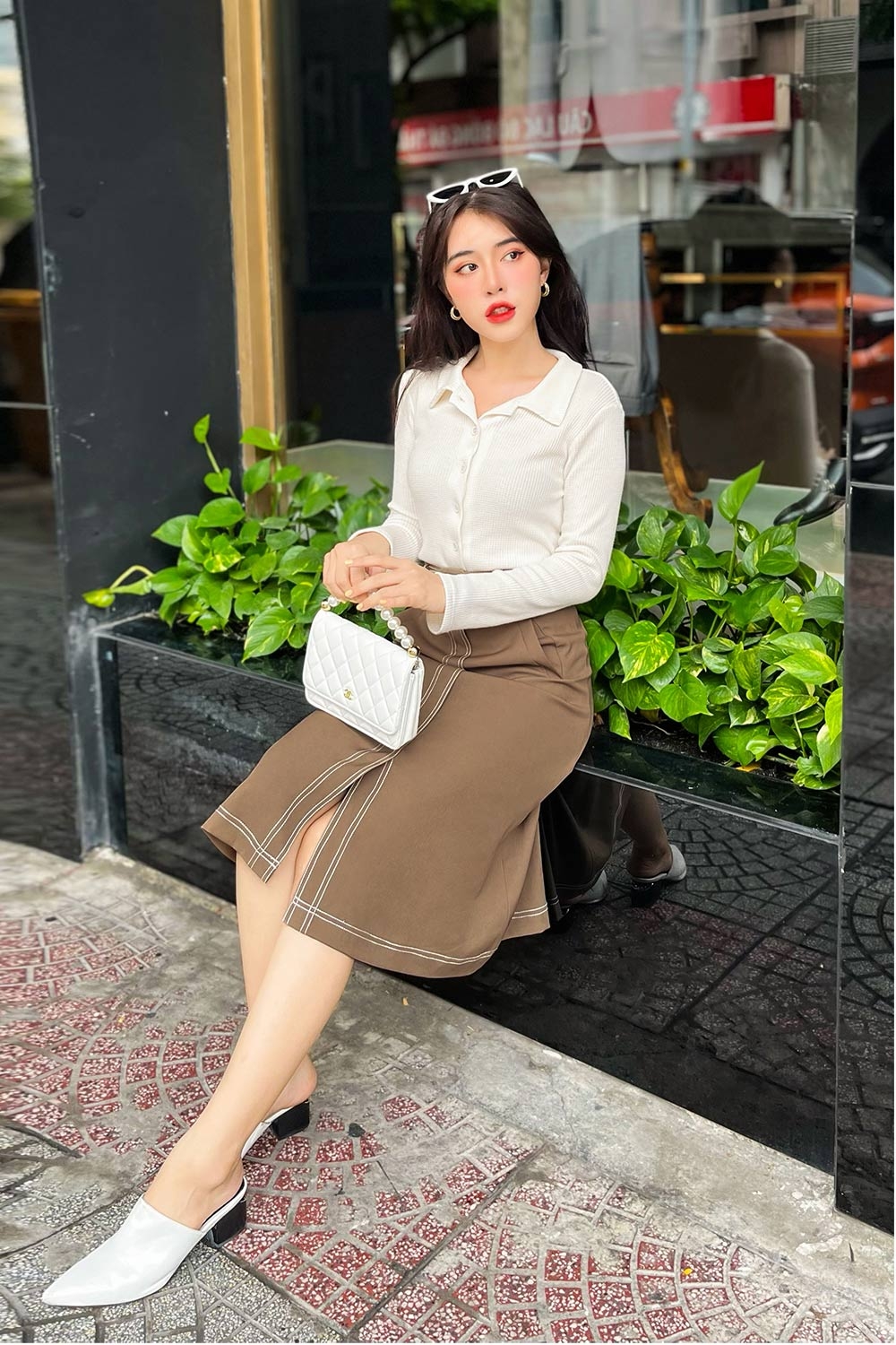 Áo thun ôm tay dài phối nút 