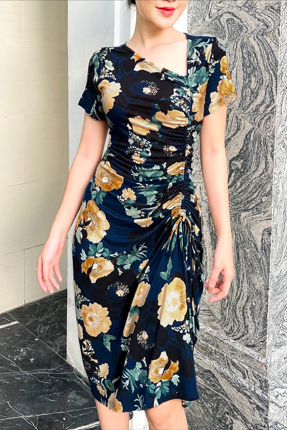 Đầm thun ôm họa tiết hoa phối dây rút 