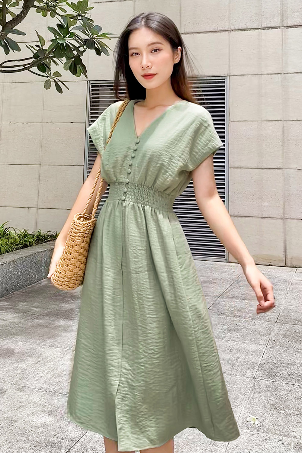 Đầm xòe công sở eo bo chun phối nút 