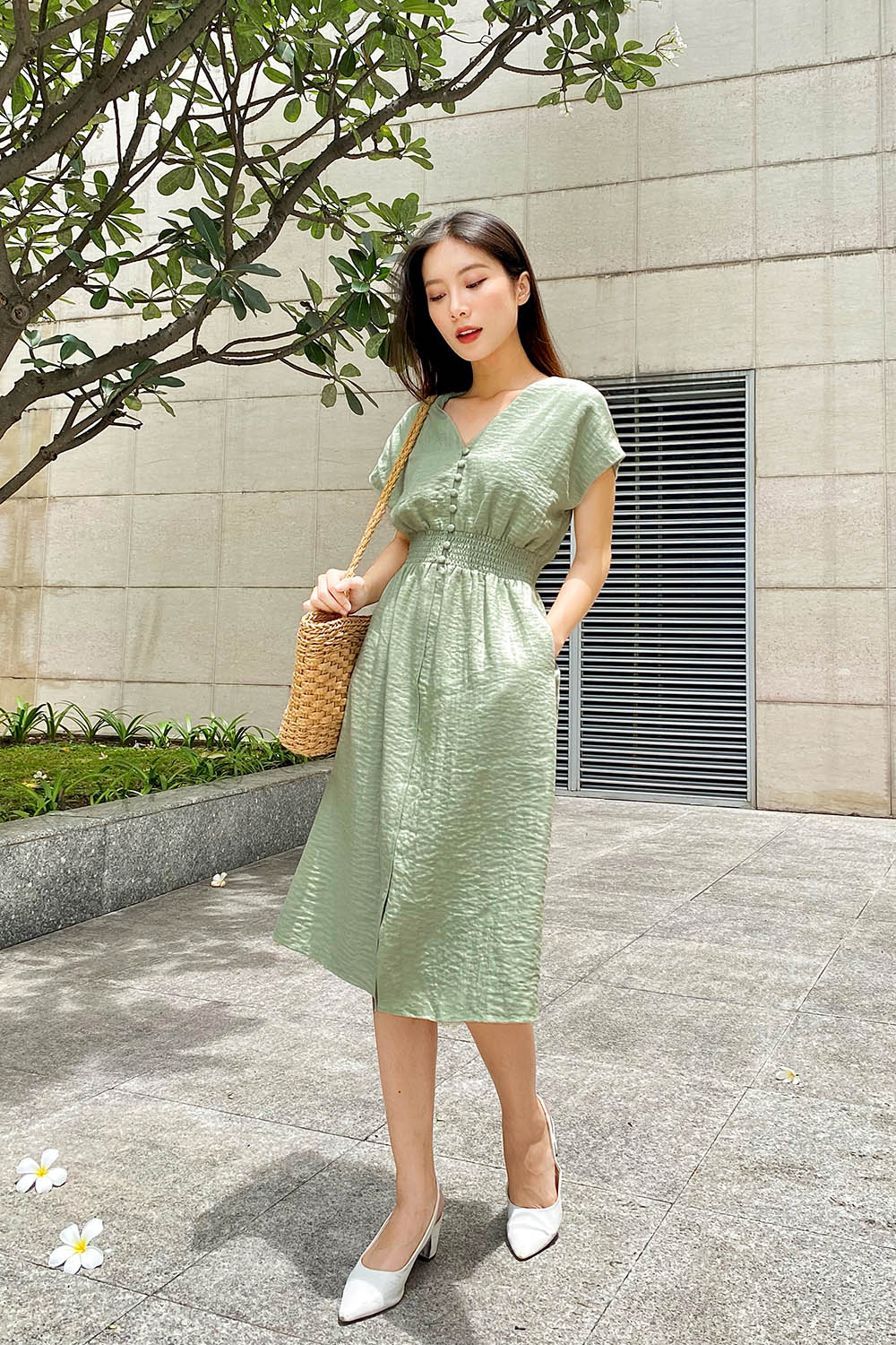 Đầm xòe công sở eo bo chun phối nút 