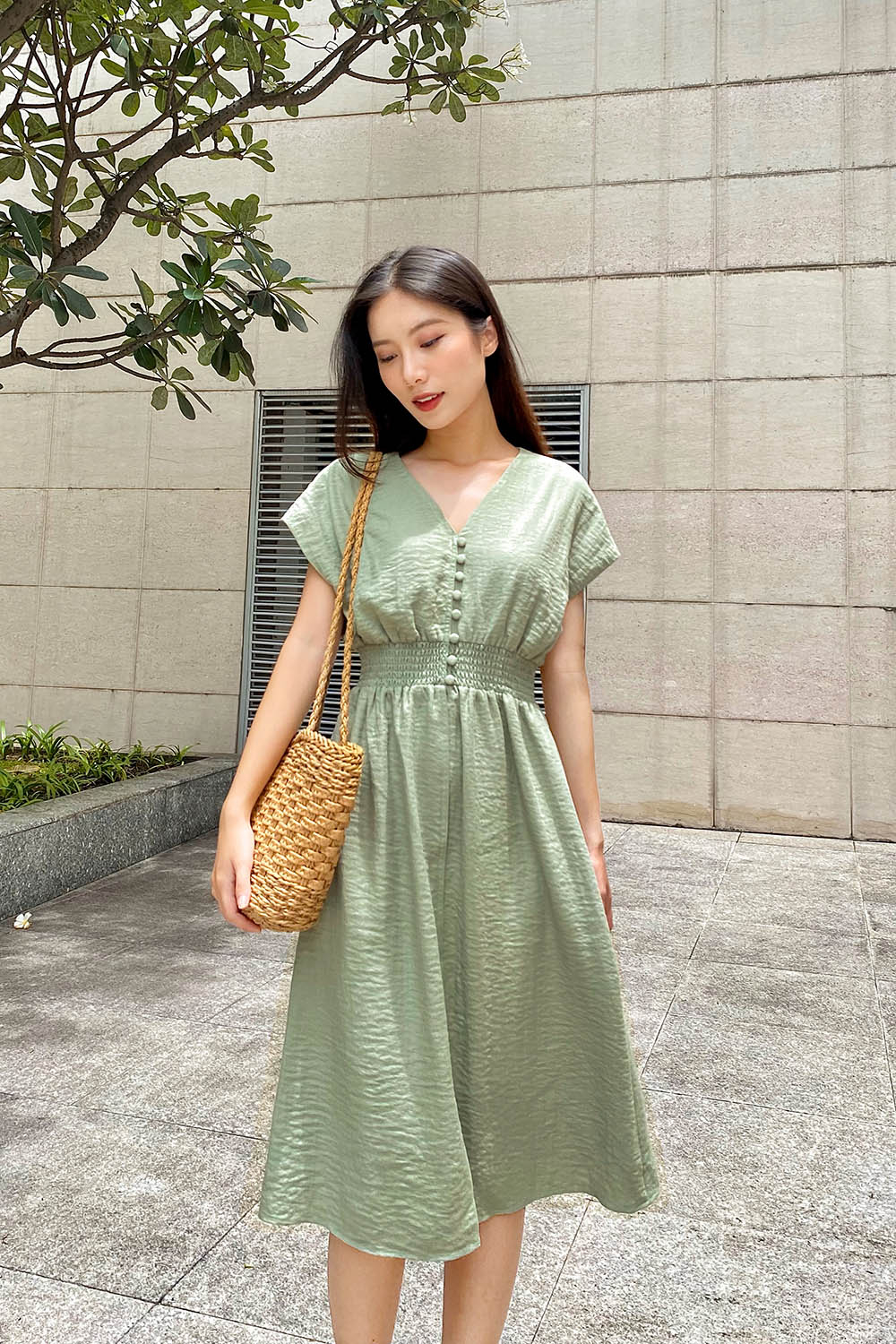 Đầm xòe công sở eo bo chun phối nút 