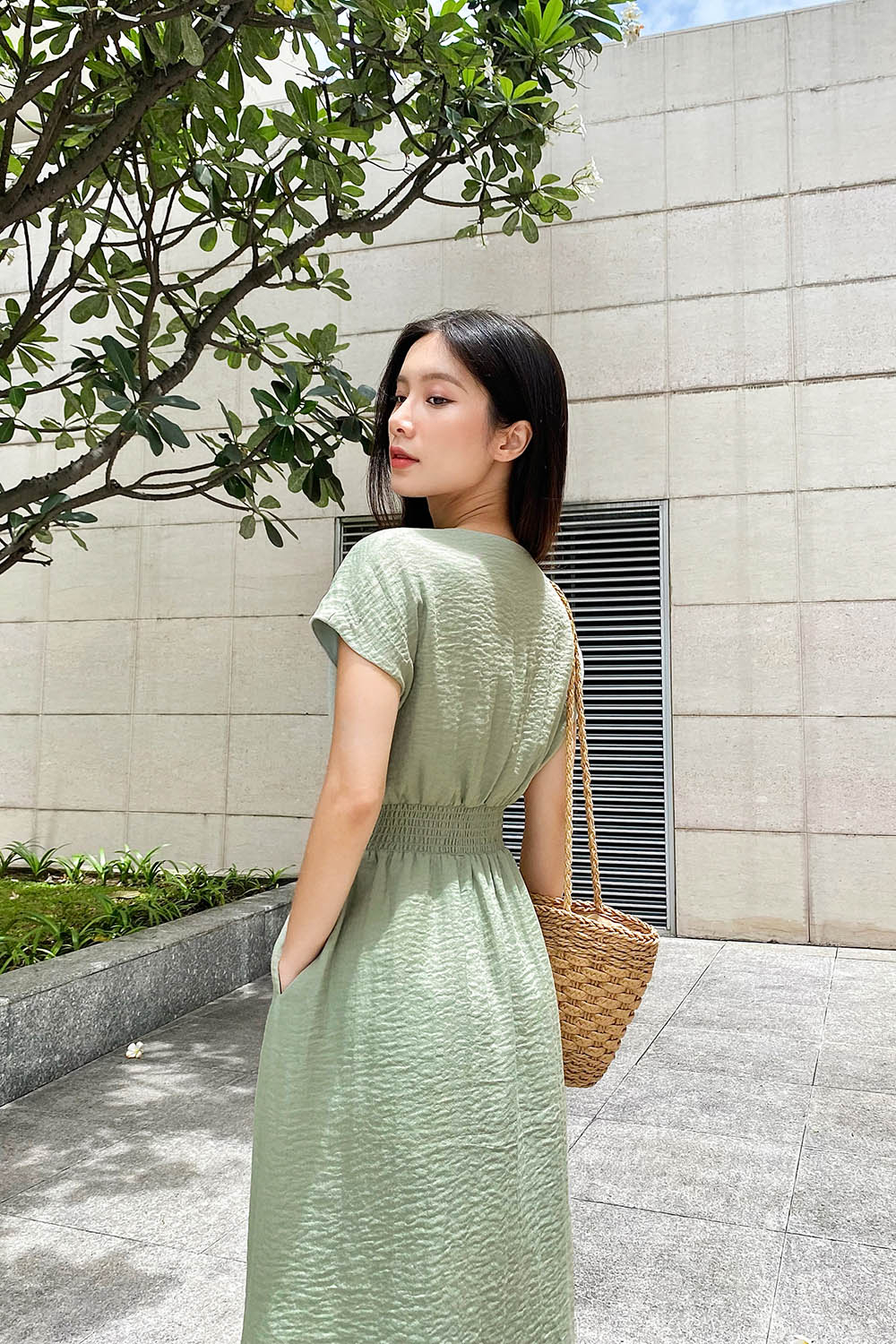 Đầm xòe công sở eo bo chun phối nút 