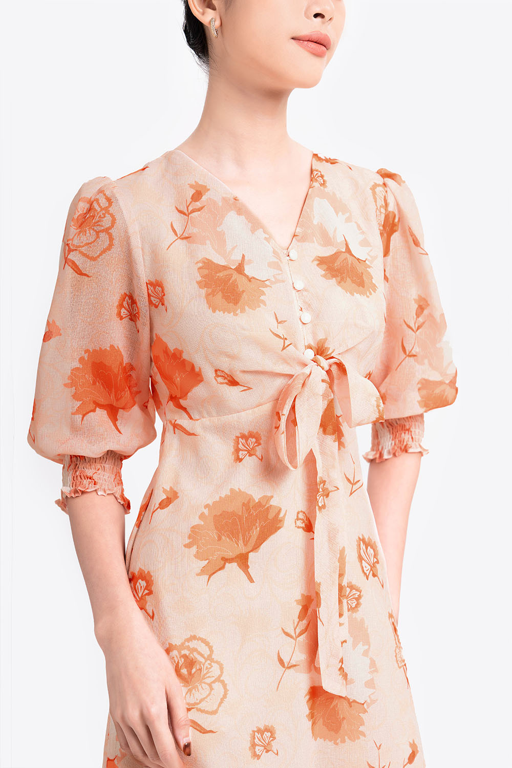 Đầm hoa chữ A đuôi cá phối nơ ở ngực