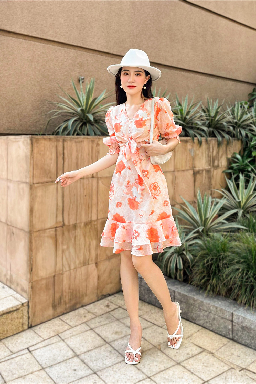 Đầm hoa chữ A đuôi cá phối nơ ở ngực