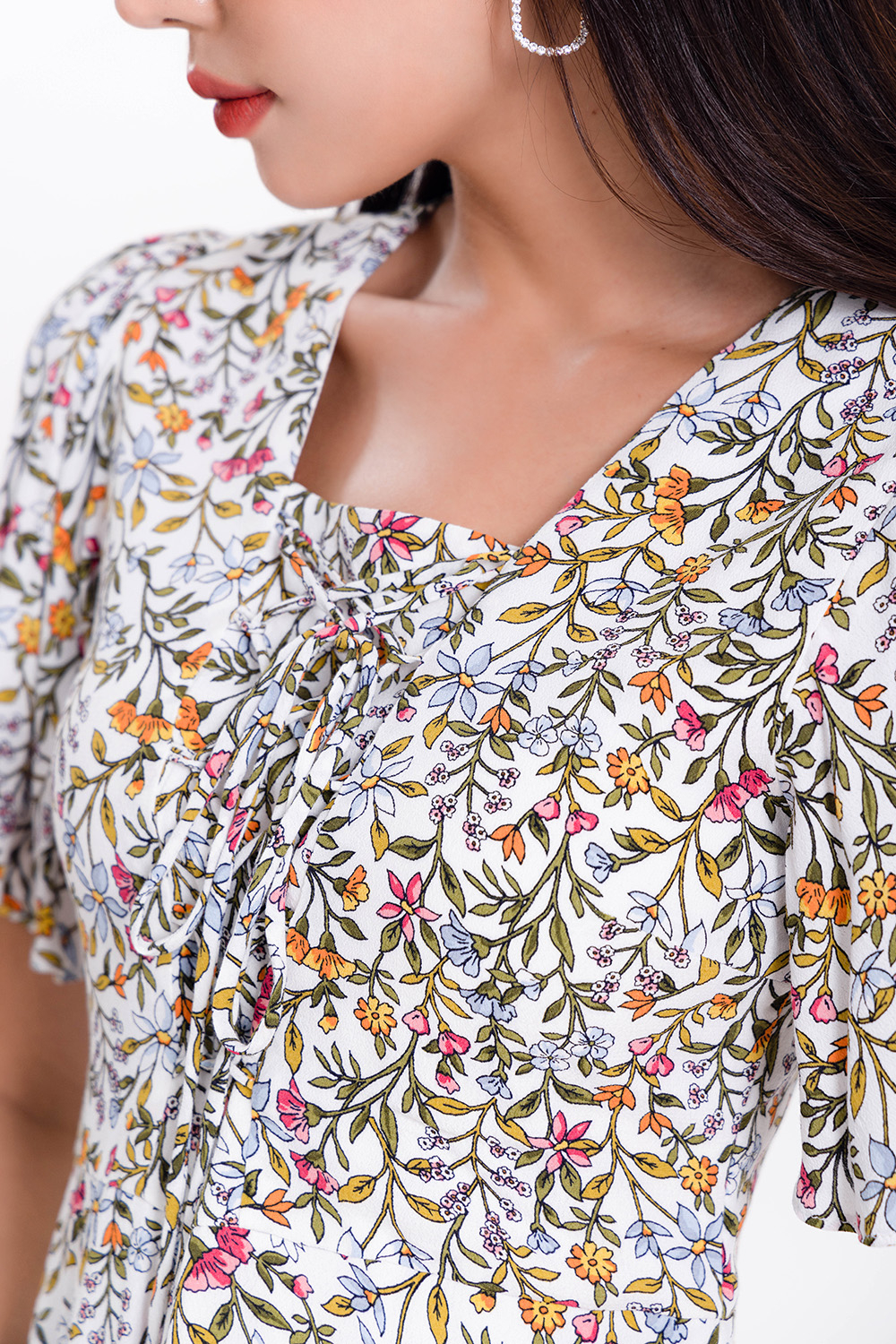 Đầm xòe hoa nhí tay cánh tiên