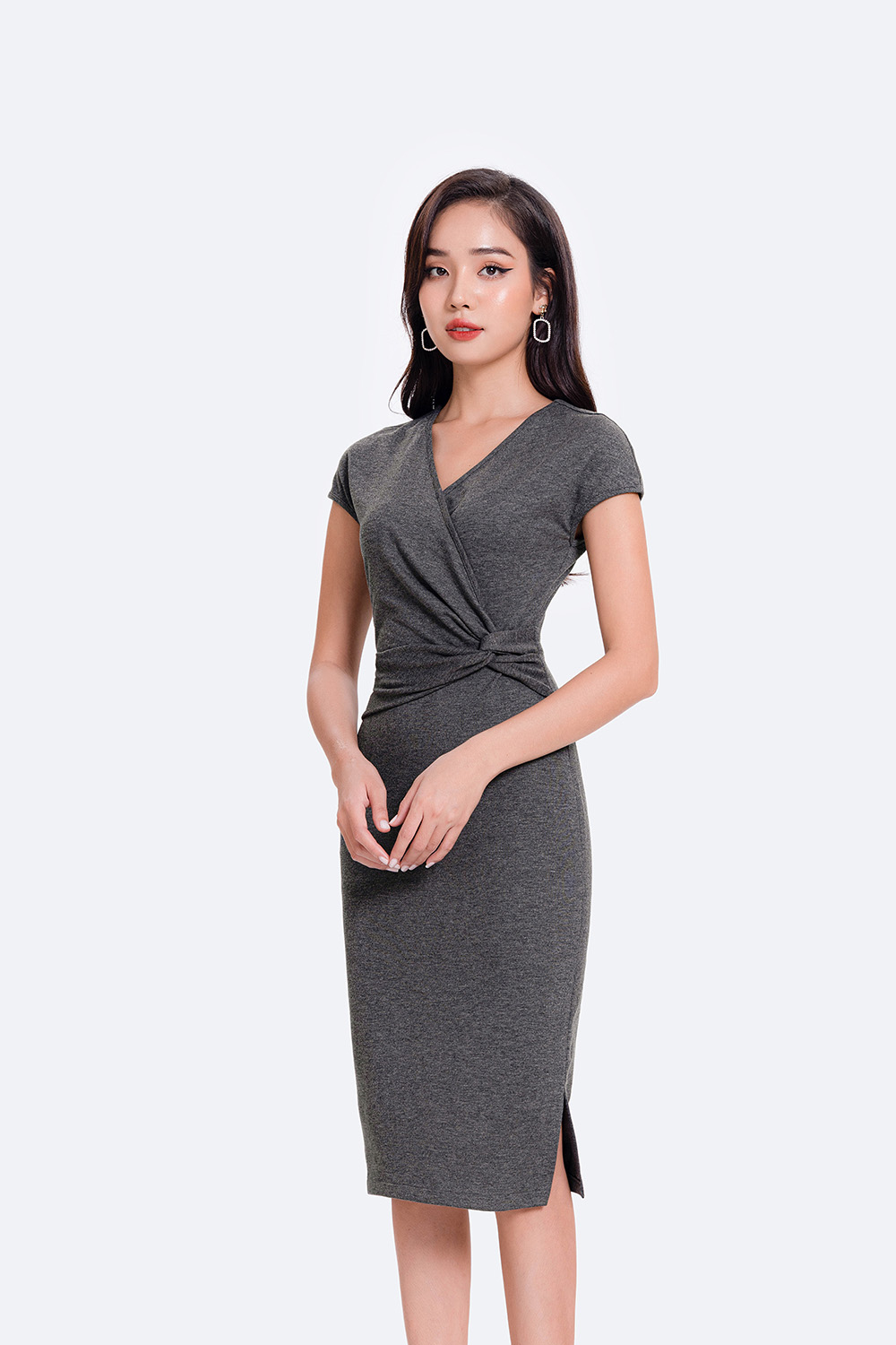 Đầm thun ôm body xoắn eo