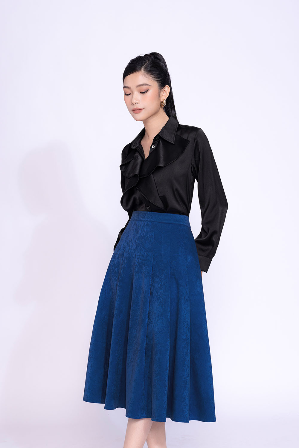 Chân váy midi dáng xòe xếp ly