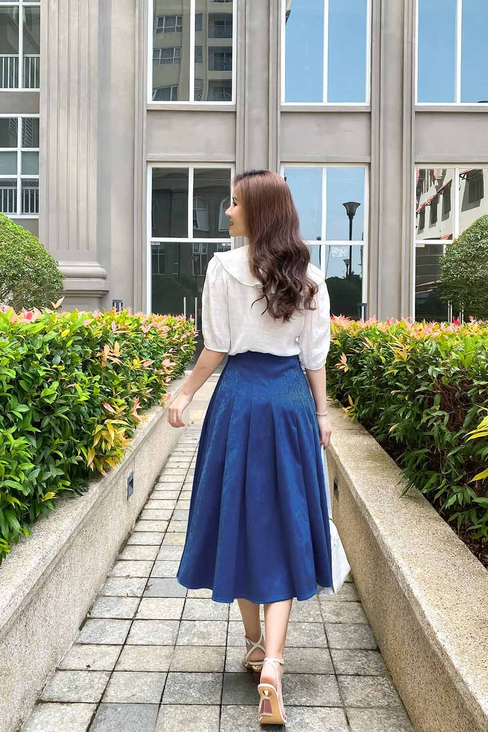 Chân váy midi dáng xòe xếp ly