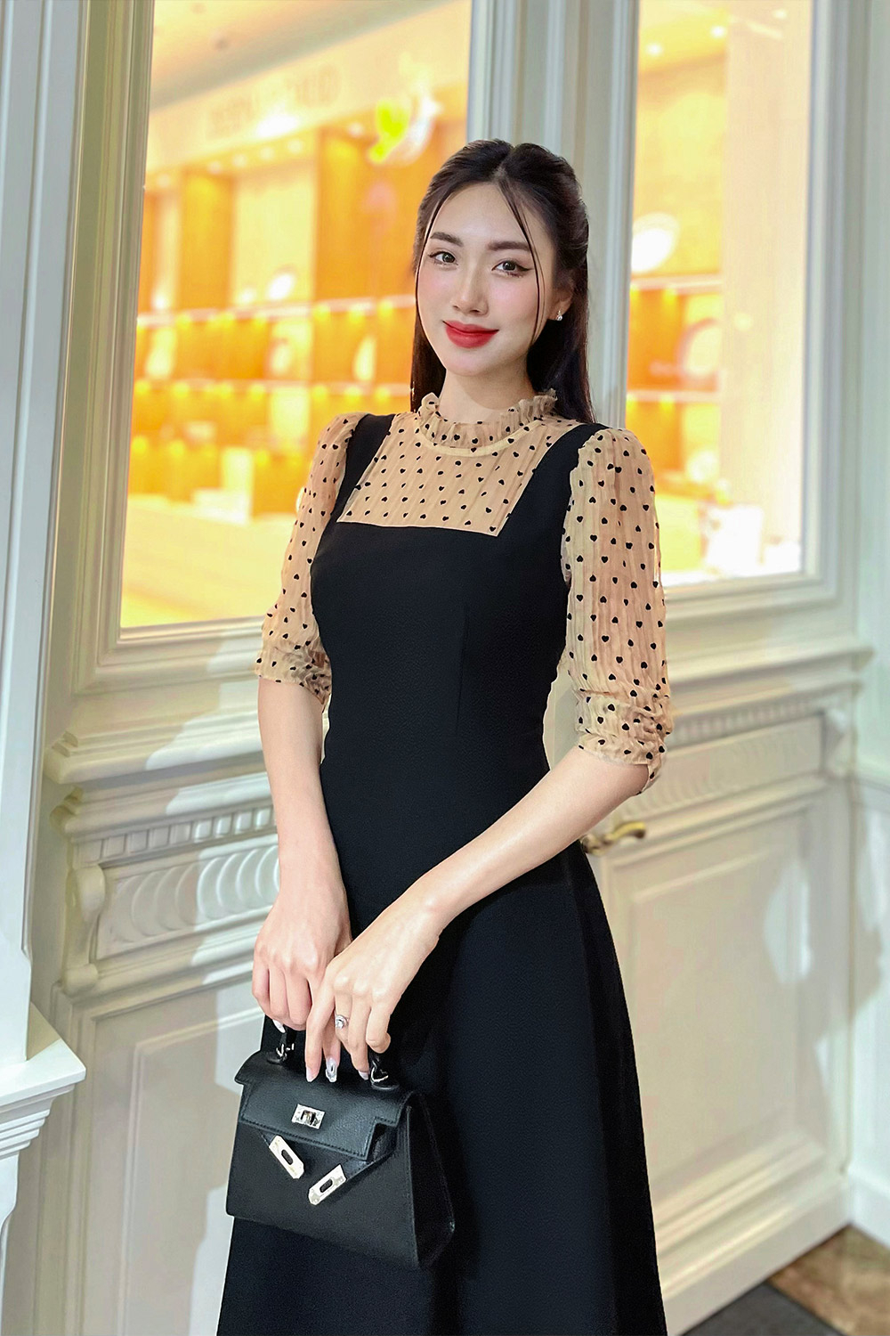 Đầm xòe đen công sở phối chấm bi