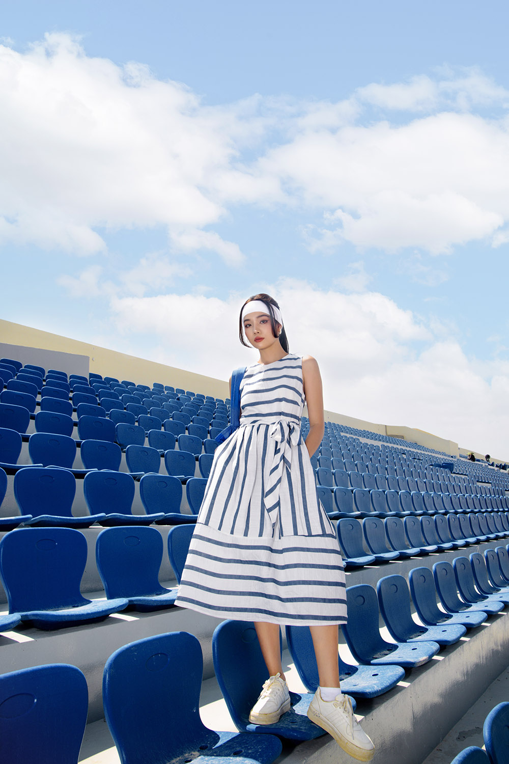 Đầm xòe họa tiết kẻ phối dây nơ eo