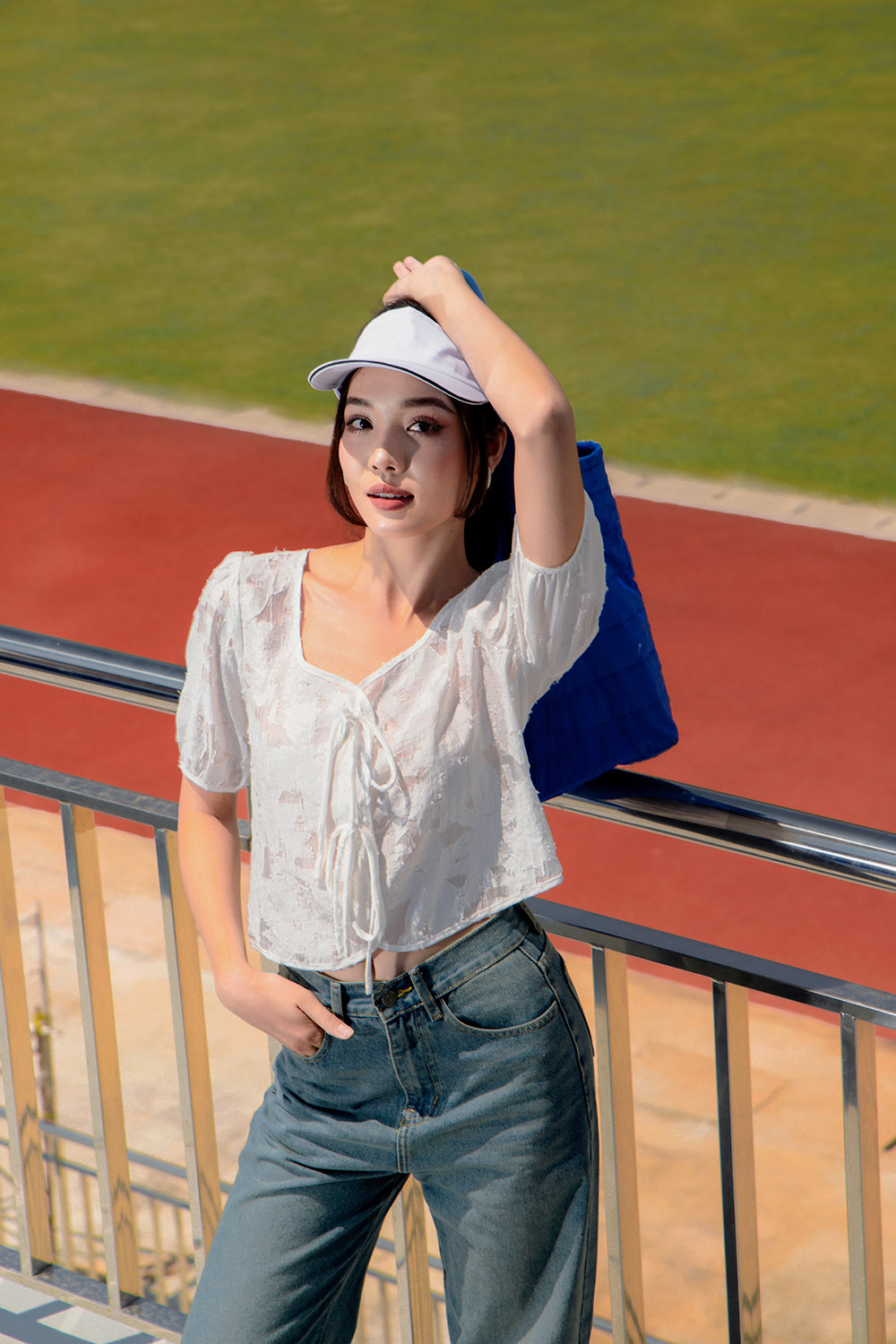 Áo kiểu nữ màu trắng phối nơ