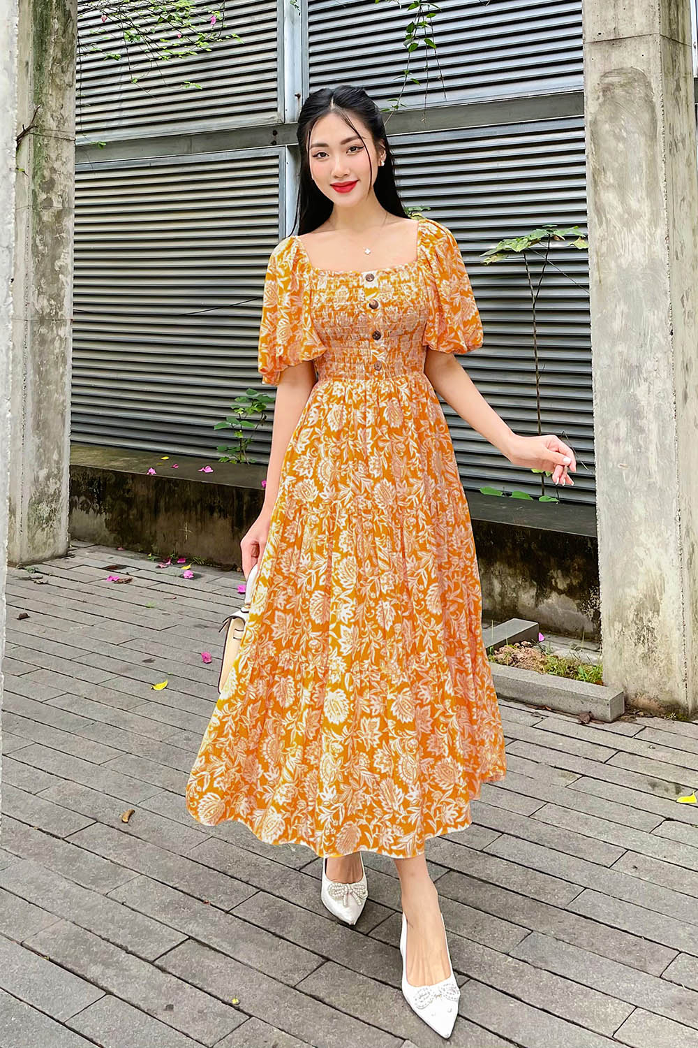 Đầm xòe dáng dài bo chun ngực phối nút