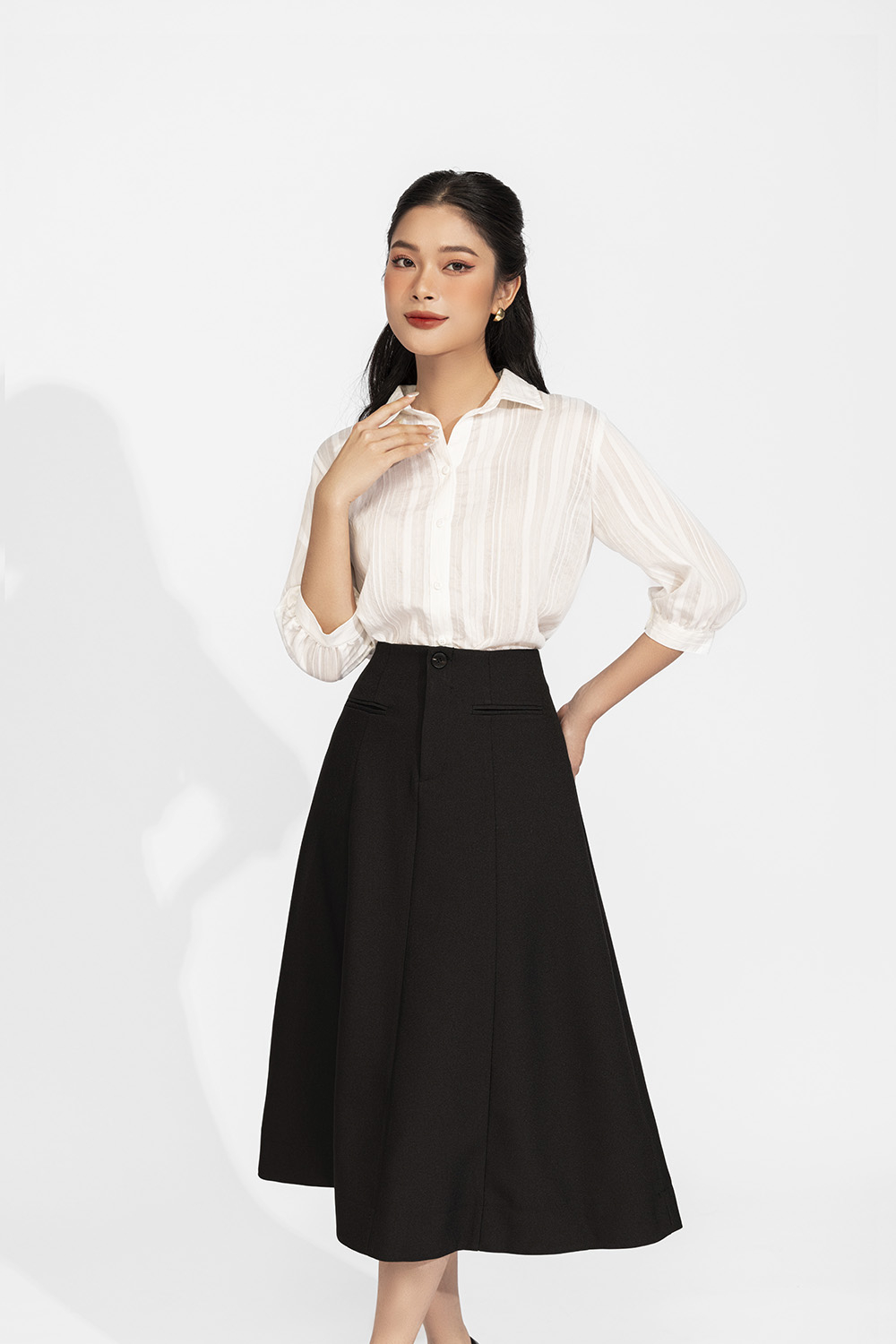 Áo sơ mi trắng tay lửng phồng nhẹ