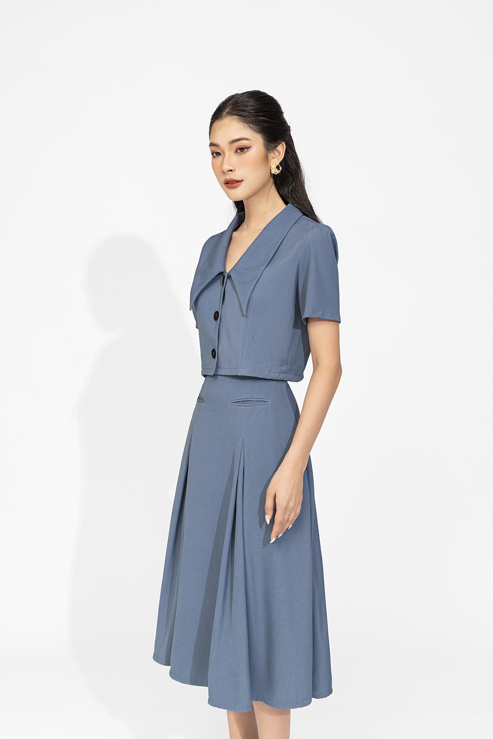 Chân váy công sở dáng xòe phối hai túi trước