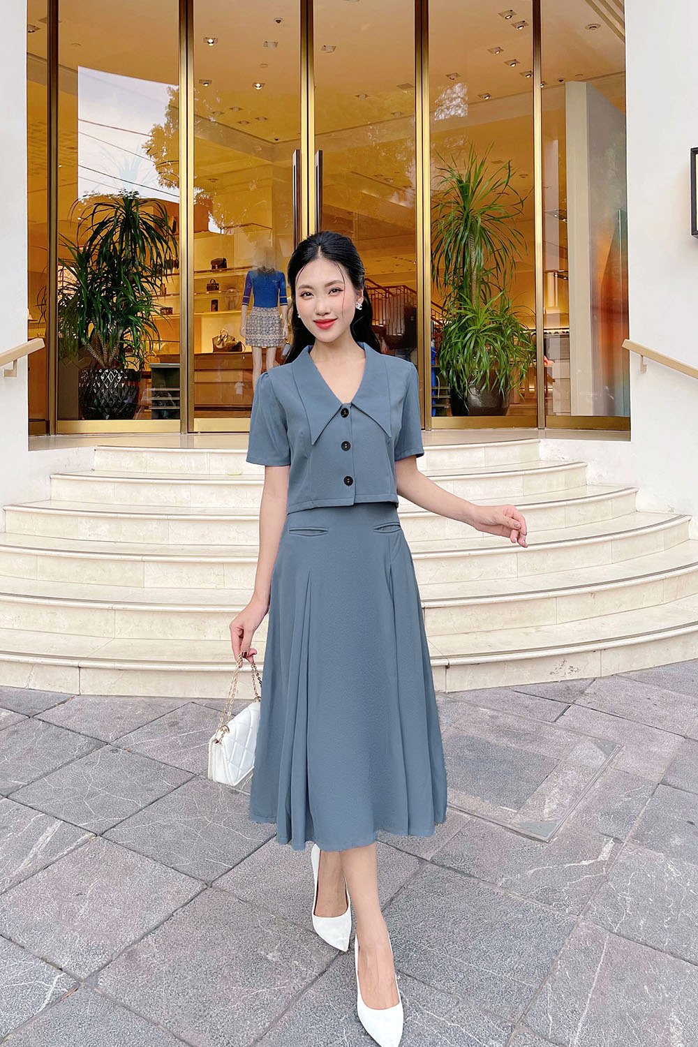 Chân váy công sở dáng xòe phối hai túi trước