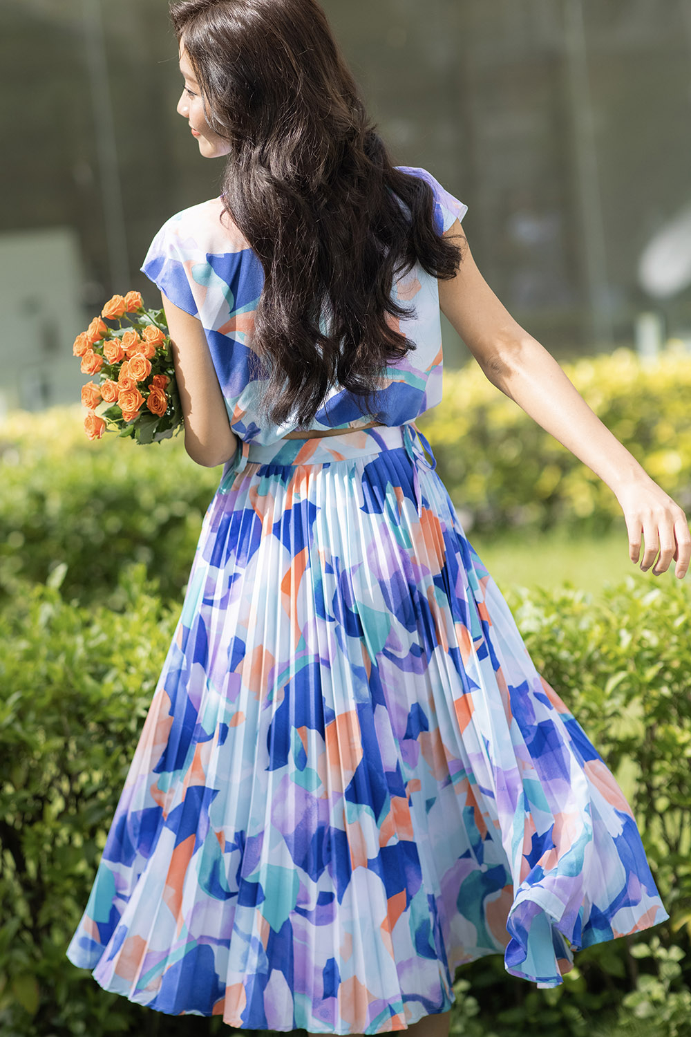 Chân váy xòe xếp ly dáng midi