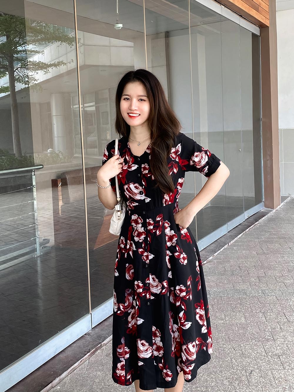 Đầm hoa dáng xòe tay lỡ cổ phối nơ