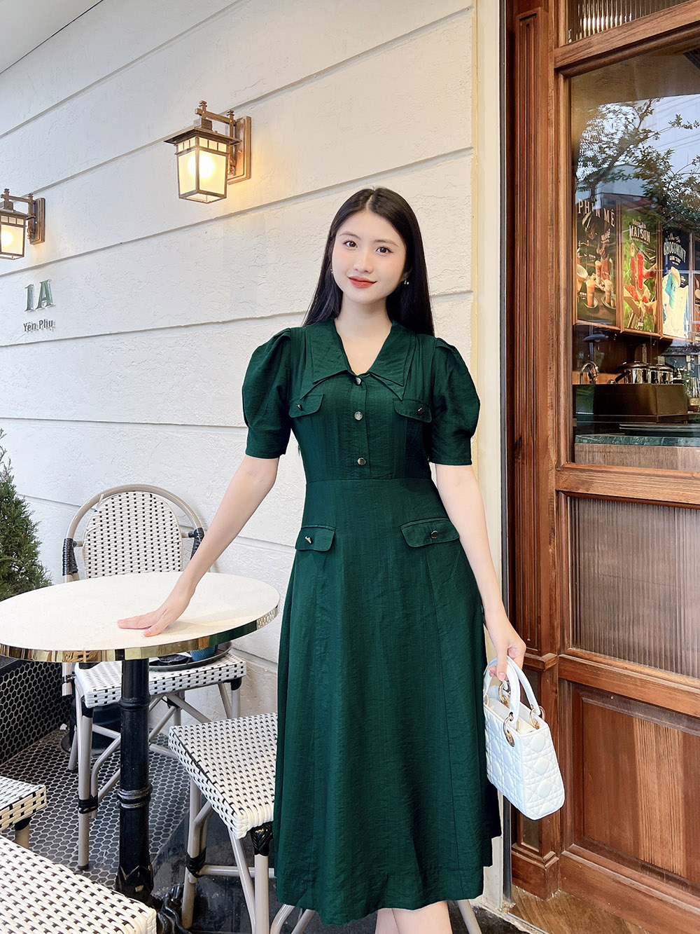 Đầm xòe phối túi màu xanh cổ sen nhọn