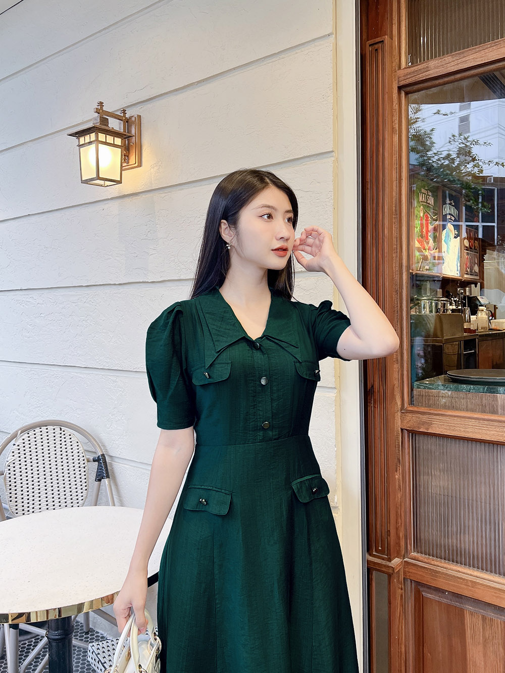 Đầm xòe phối túi màu xanh cổ sen nhọn