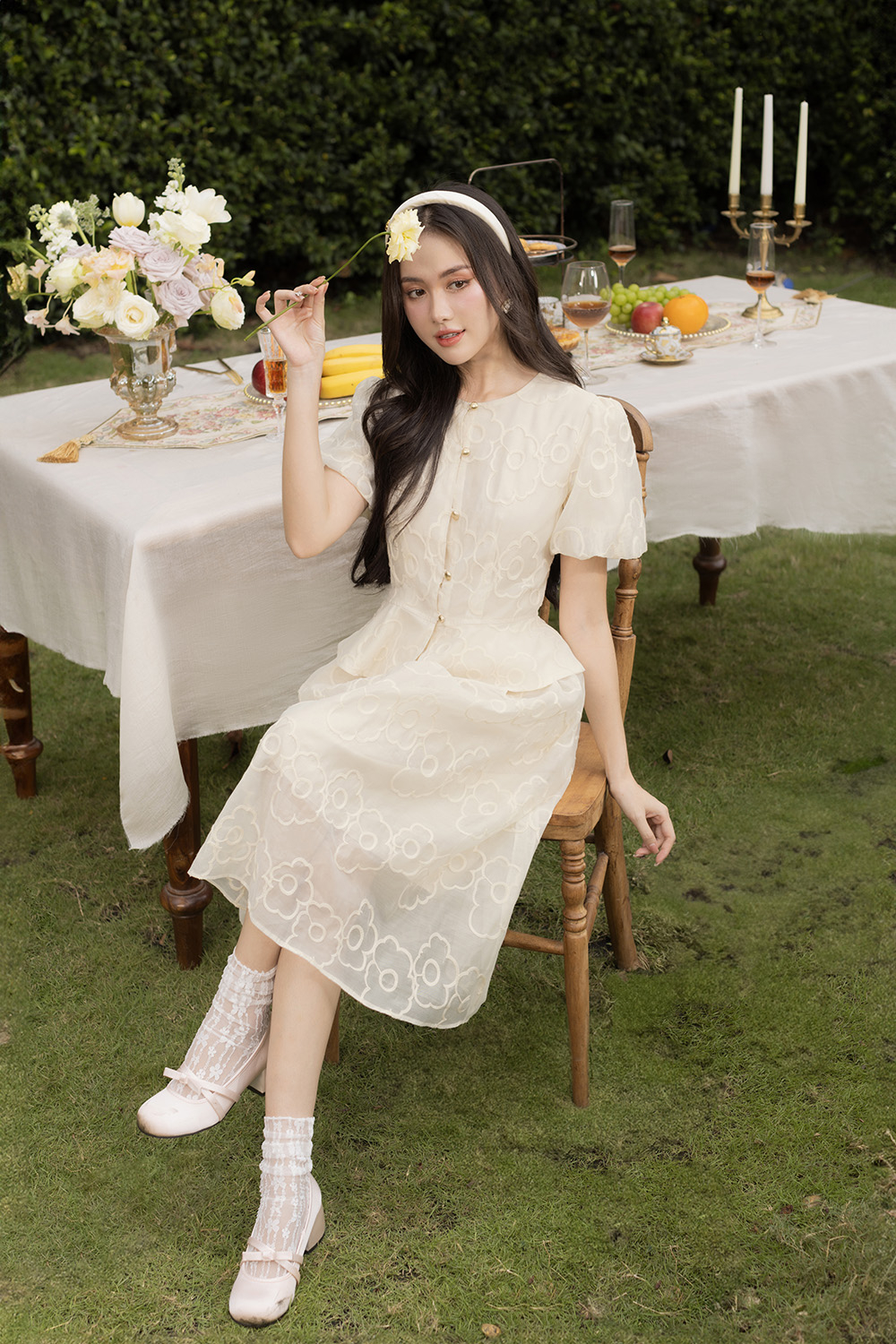 Áo kiểu peplum phối nút tay phồng