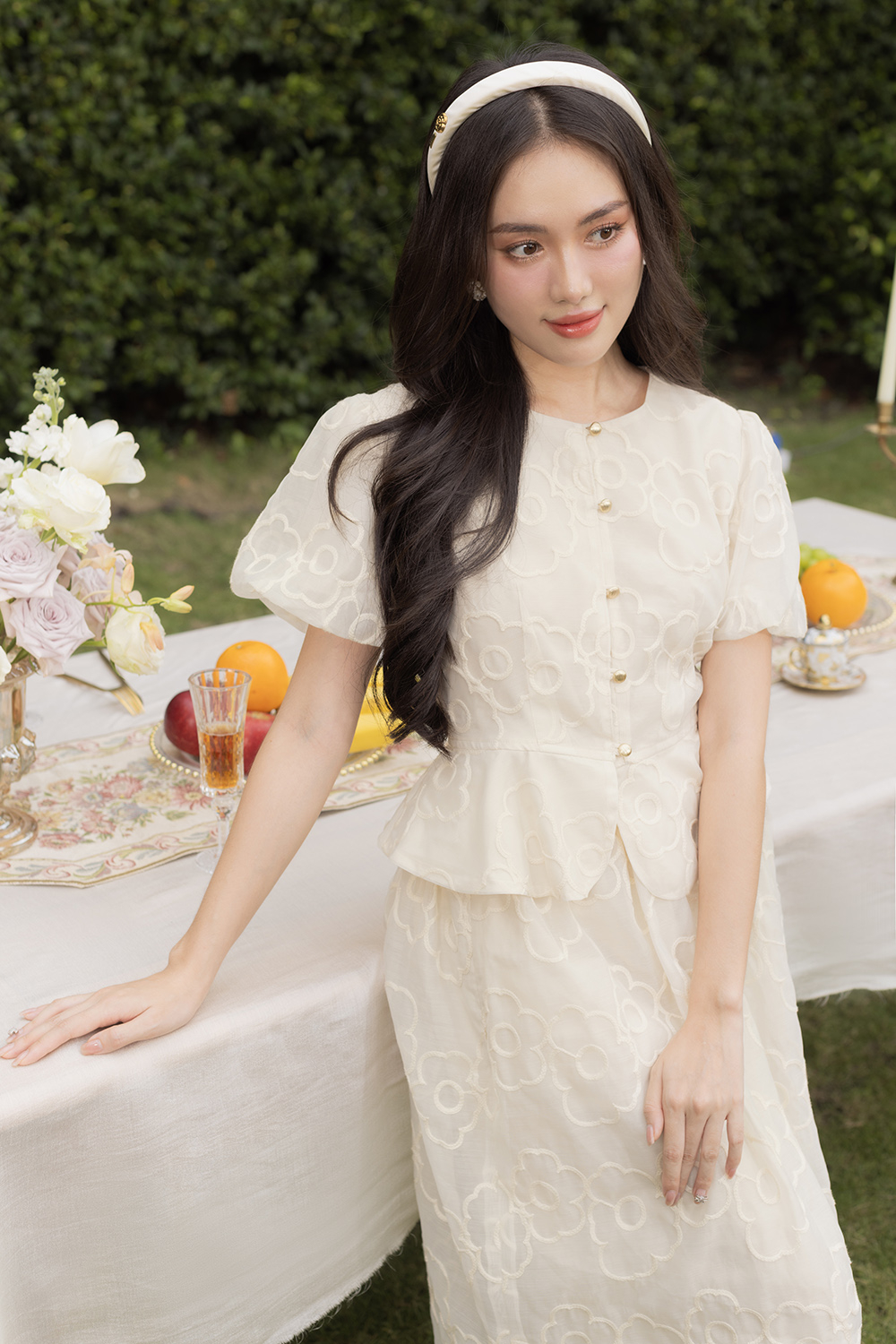 Áo kiểu peplum phối nút tay phồng