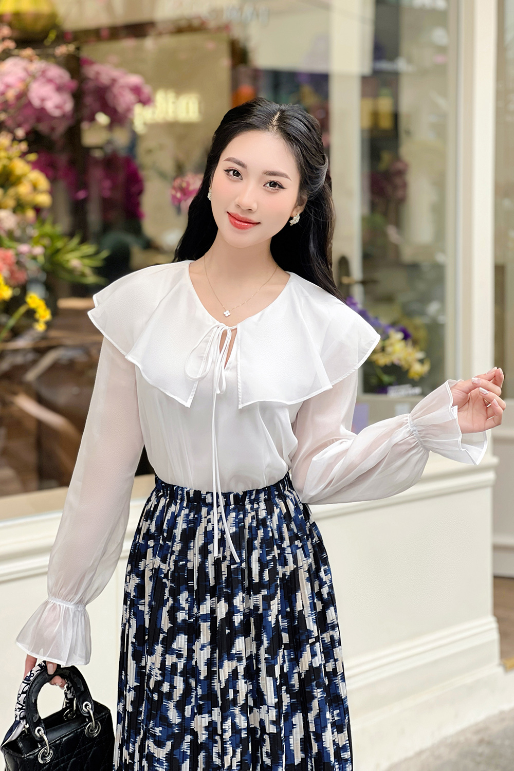 Áo kiểu nữ màu trắng phối bèo