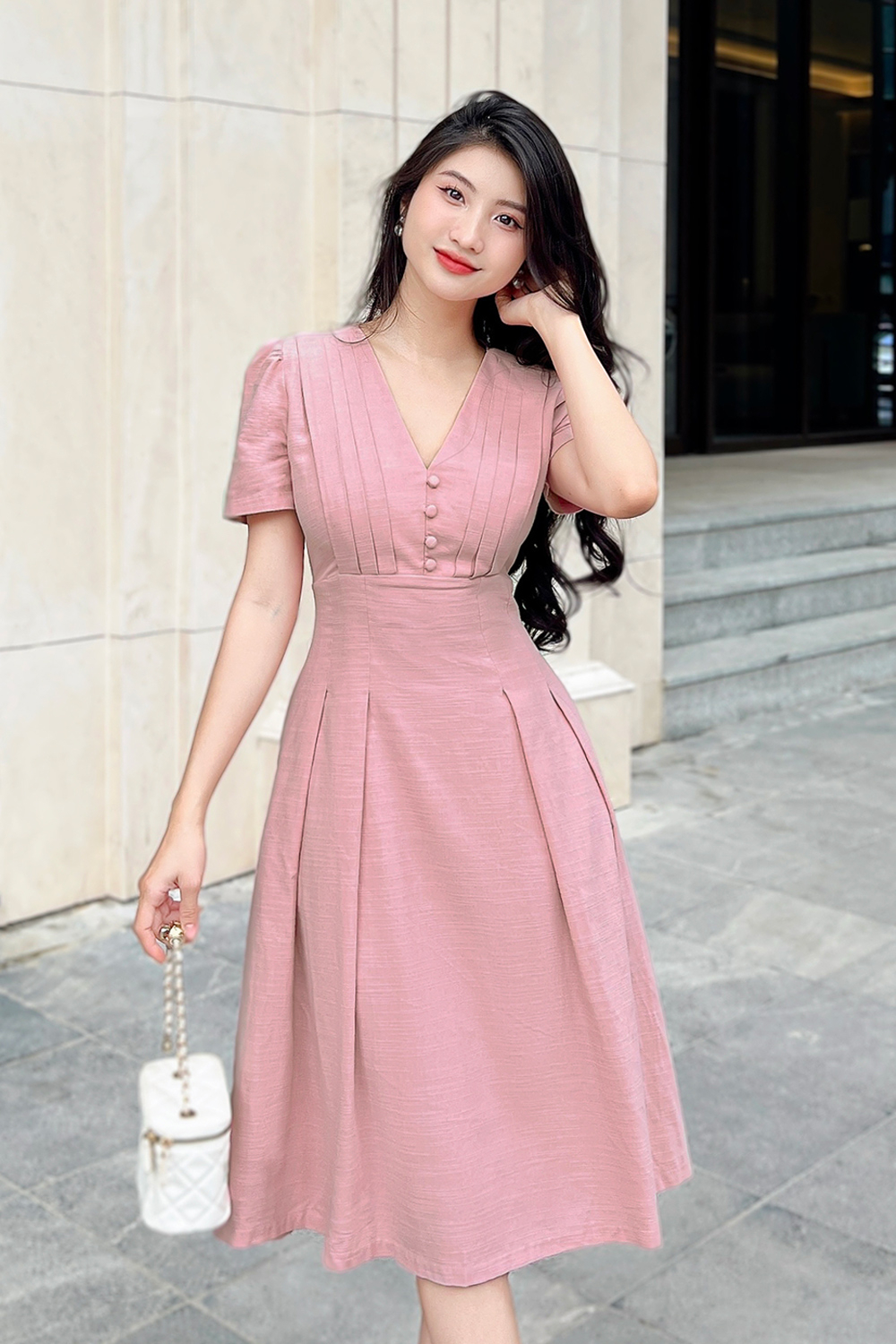 Đầm xòe hồng ngực xếp ly cổ chữ V