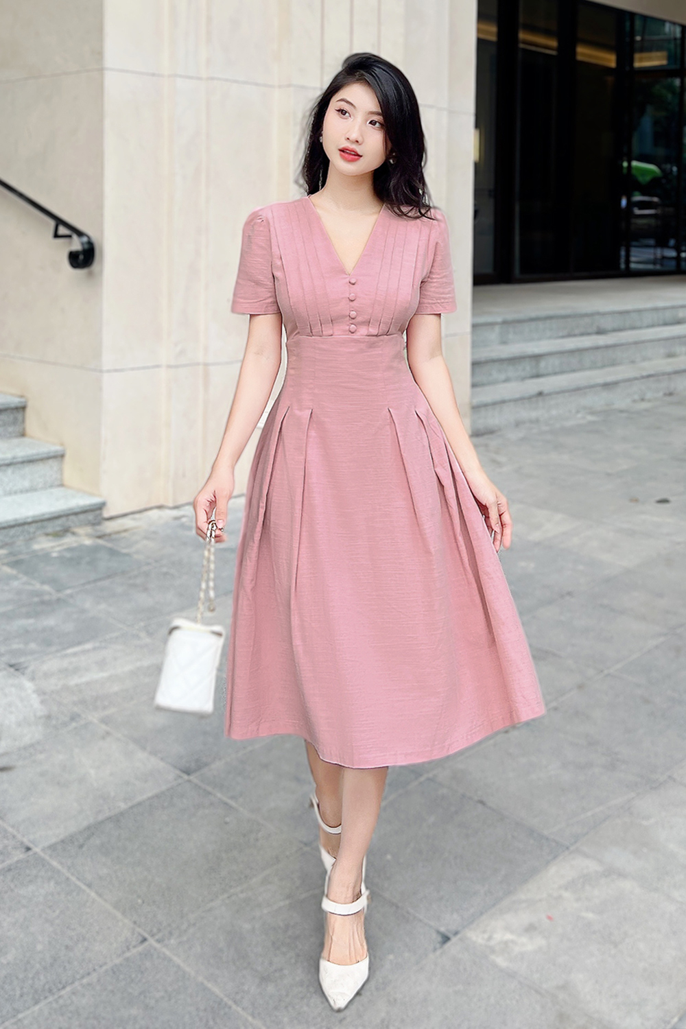 Đầm xòe hồng ngực xếp ly cổ chữ V