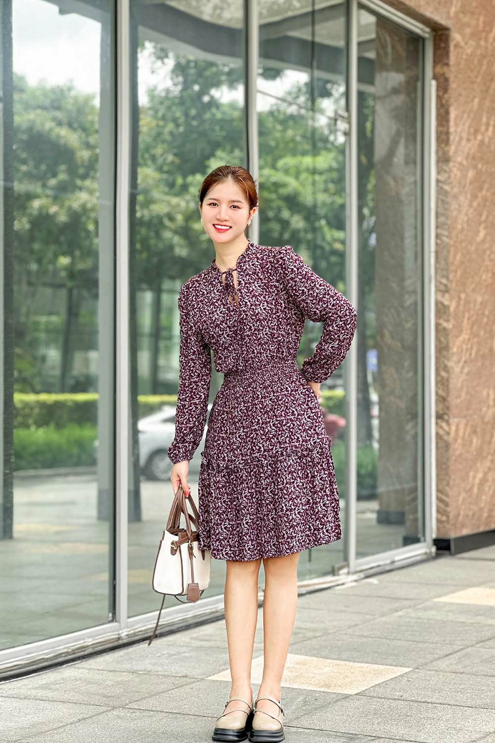 Đầm xòe họa tiết tay dài đuôi cá