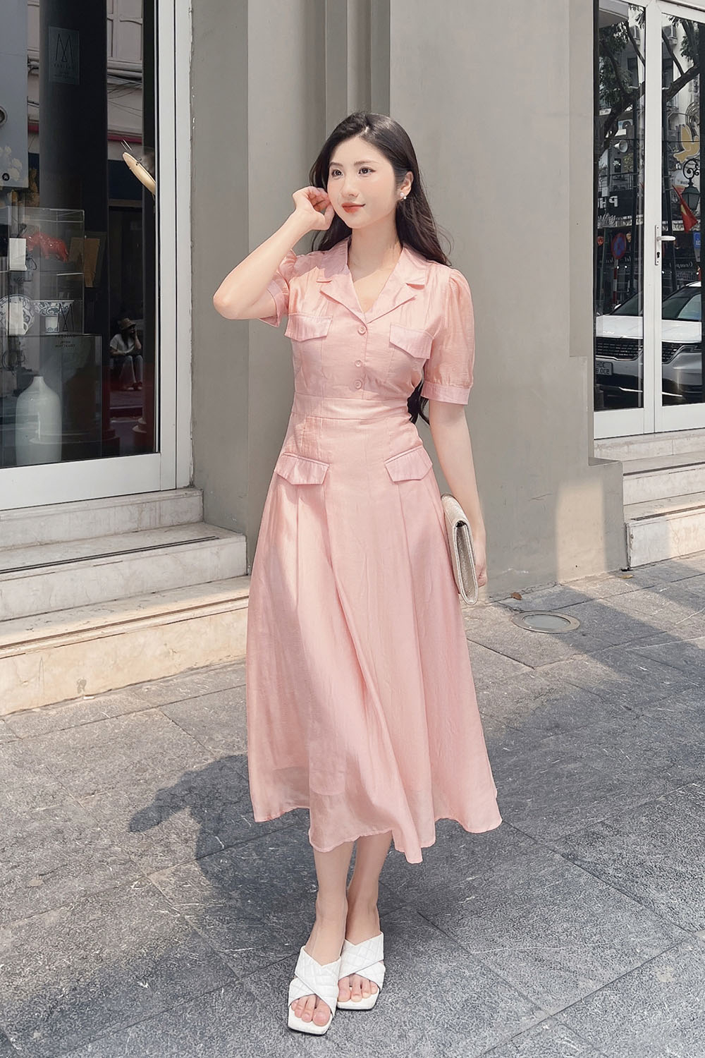 Đầm xòe cổ đan tông phối túi màu hồng