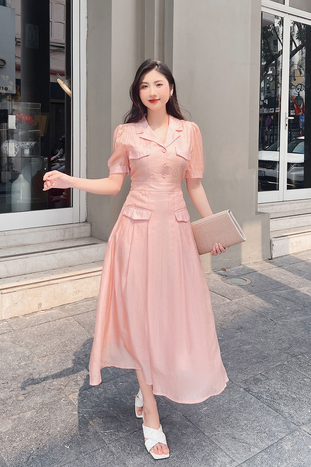 Đầm xòe cổ đan tông phối túi màu hồng