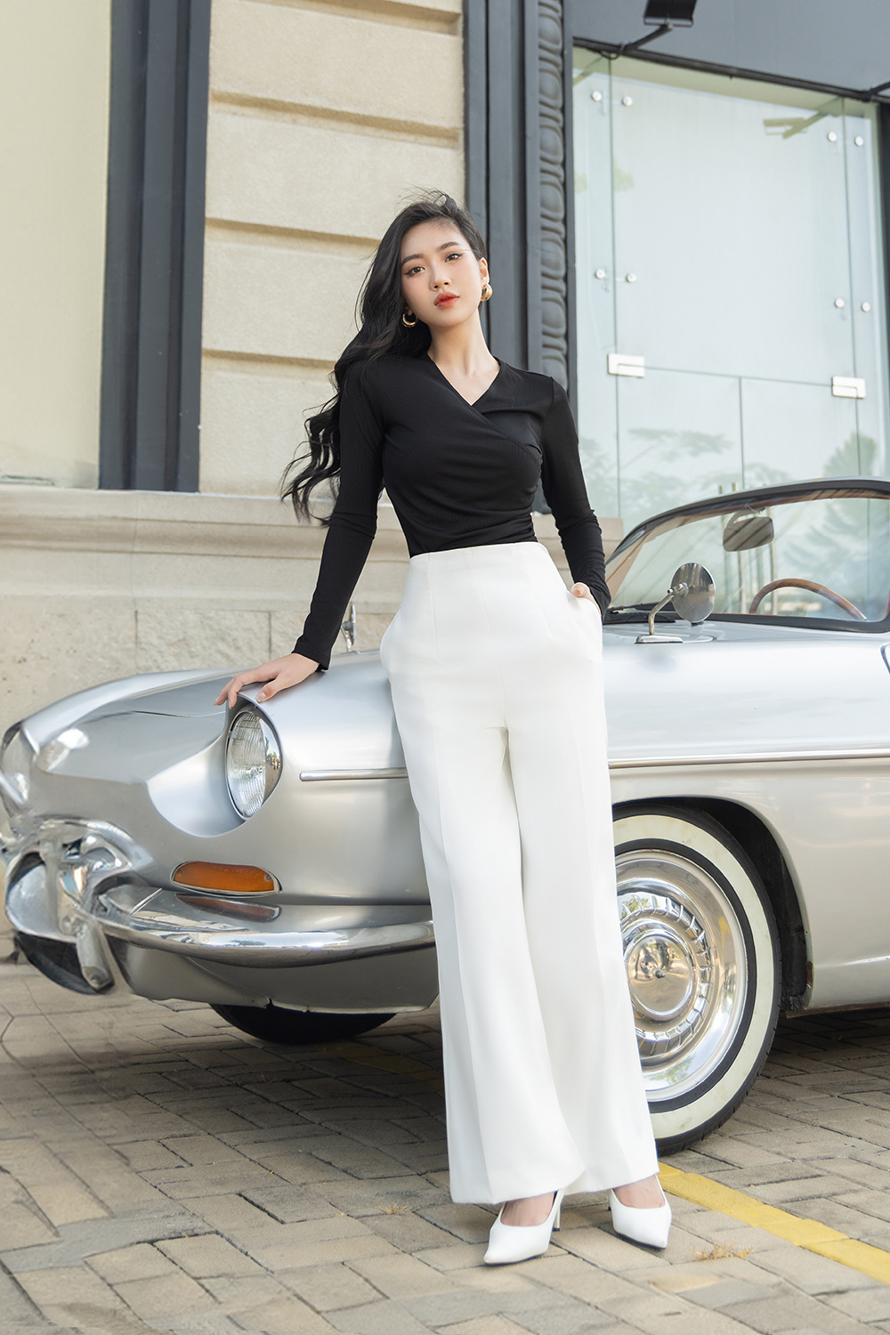 Áo thun nữ tay dài màu đen cổ đắp chéo