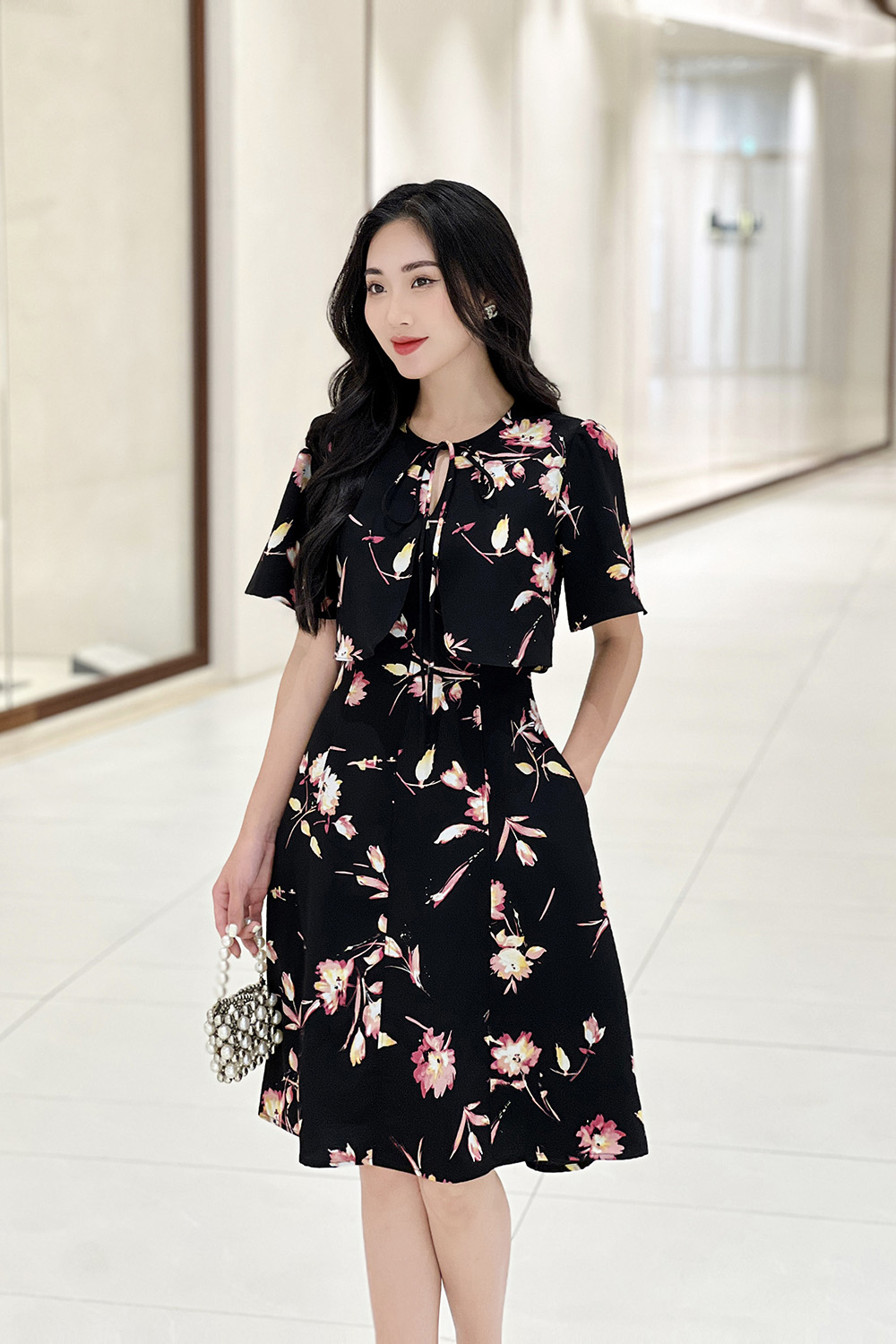 Đầm xòe hoa công sở phối áo khoác