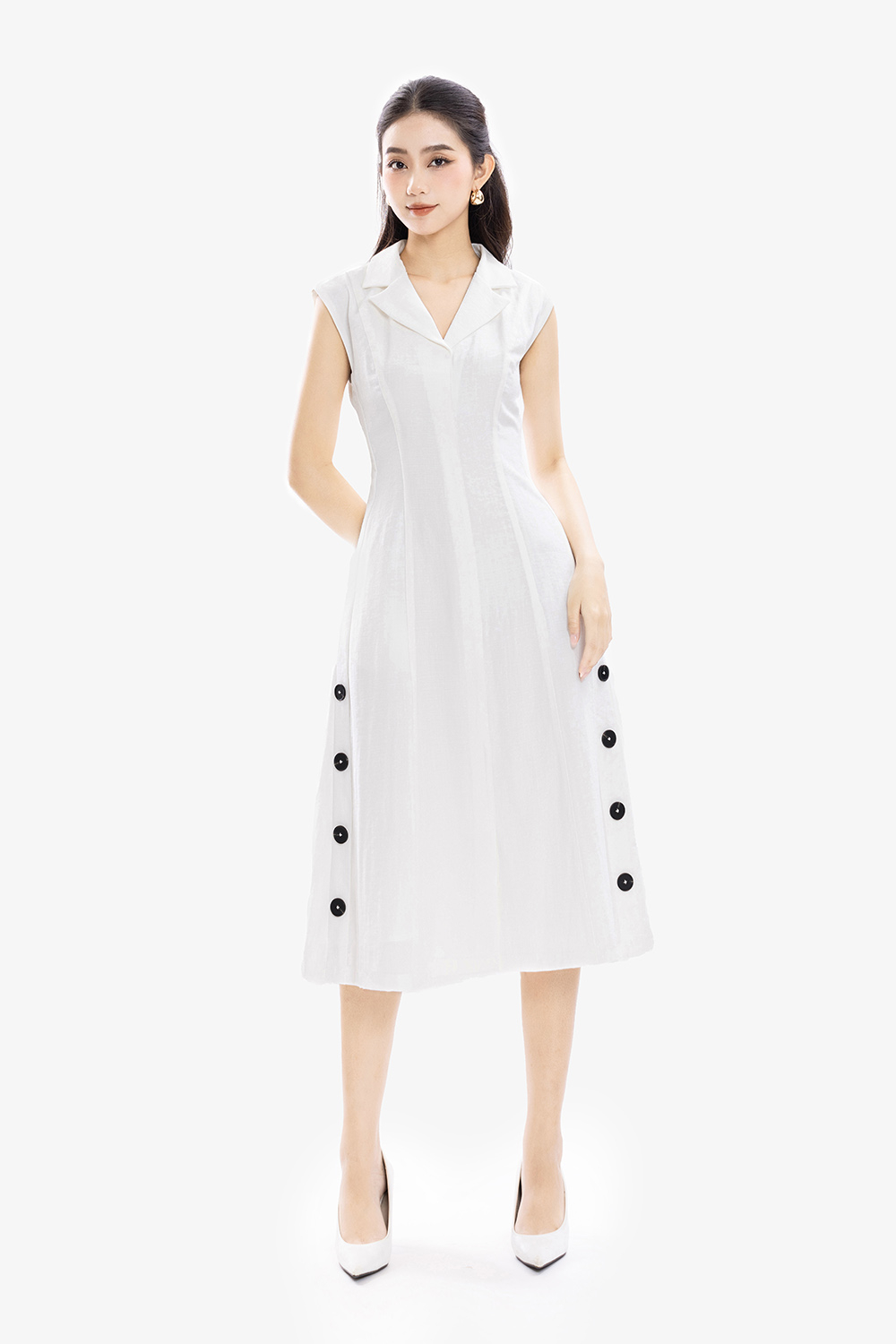 Đầm trắng cổ đan tông tay hến phối nút