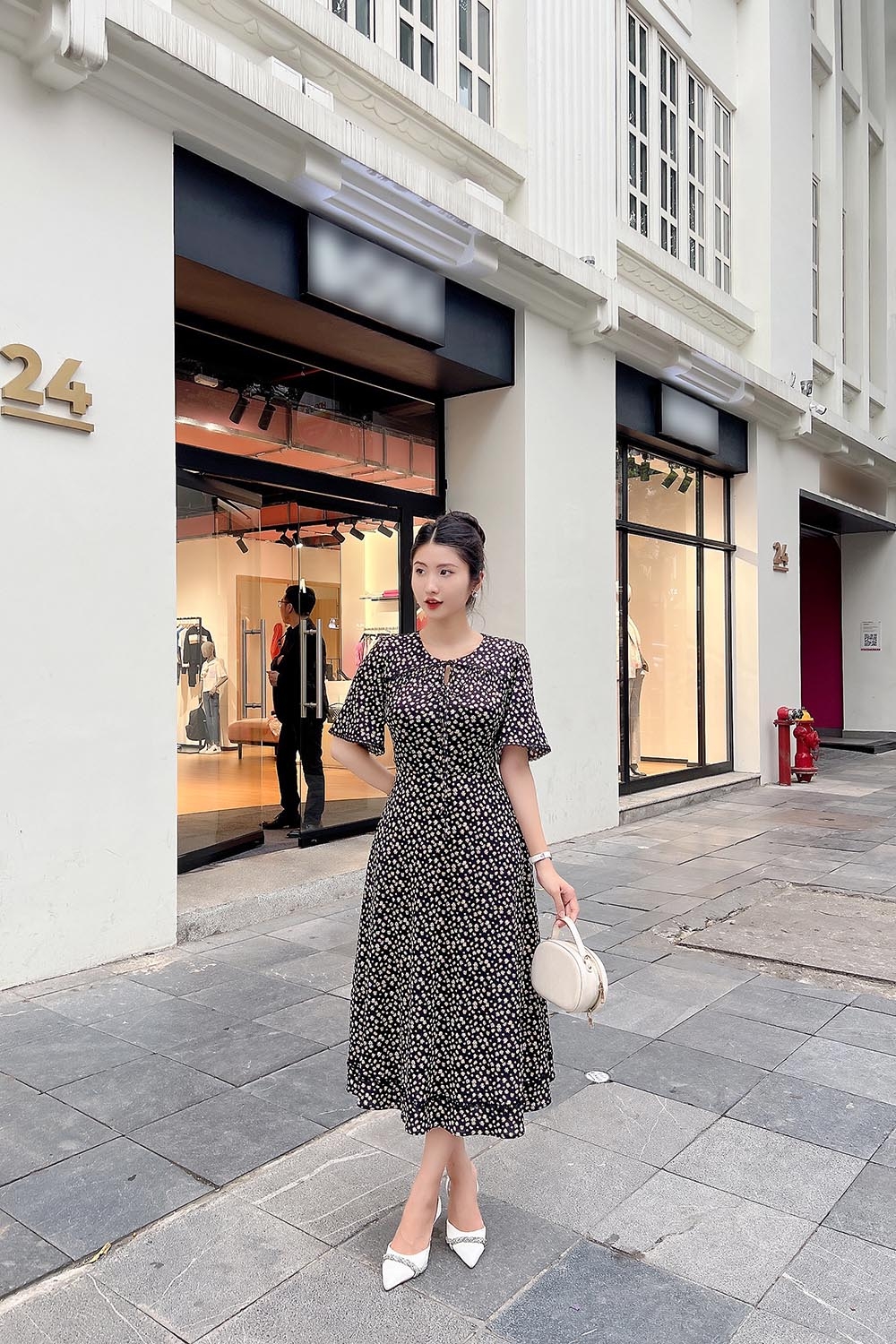 Đầm thun đen hoa công sở dáng xòe