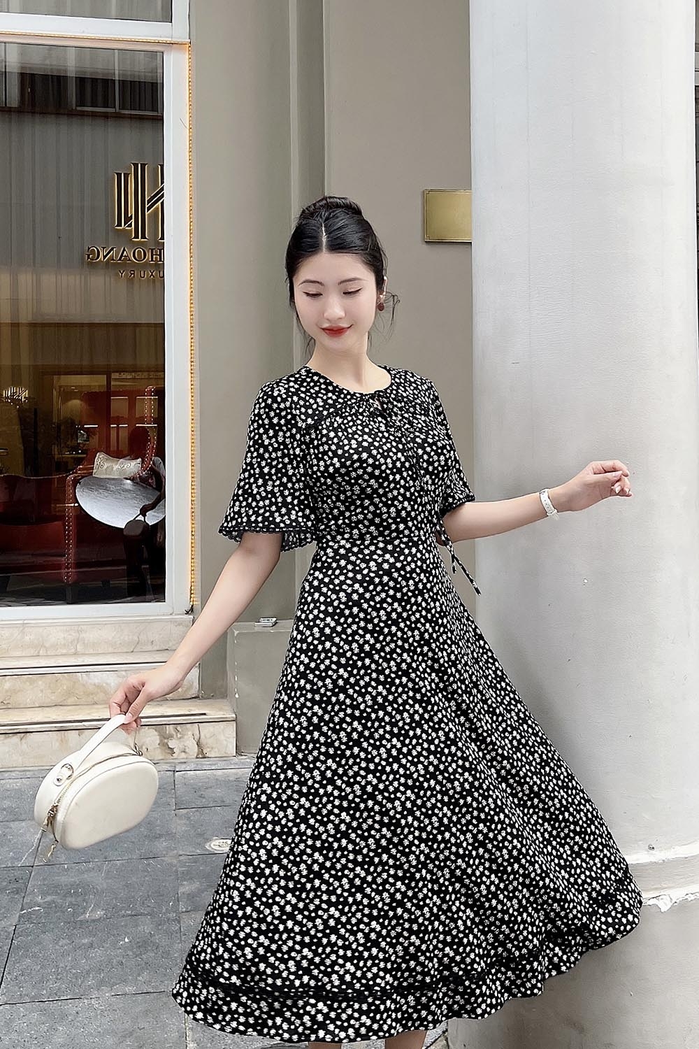 Đầm thun đen hoa công sở dáng xòe