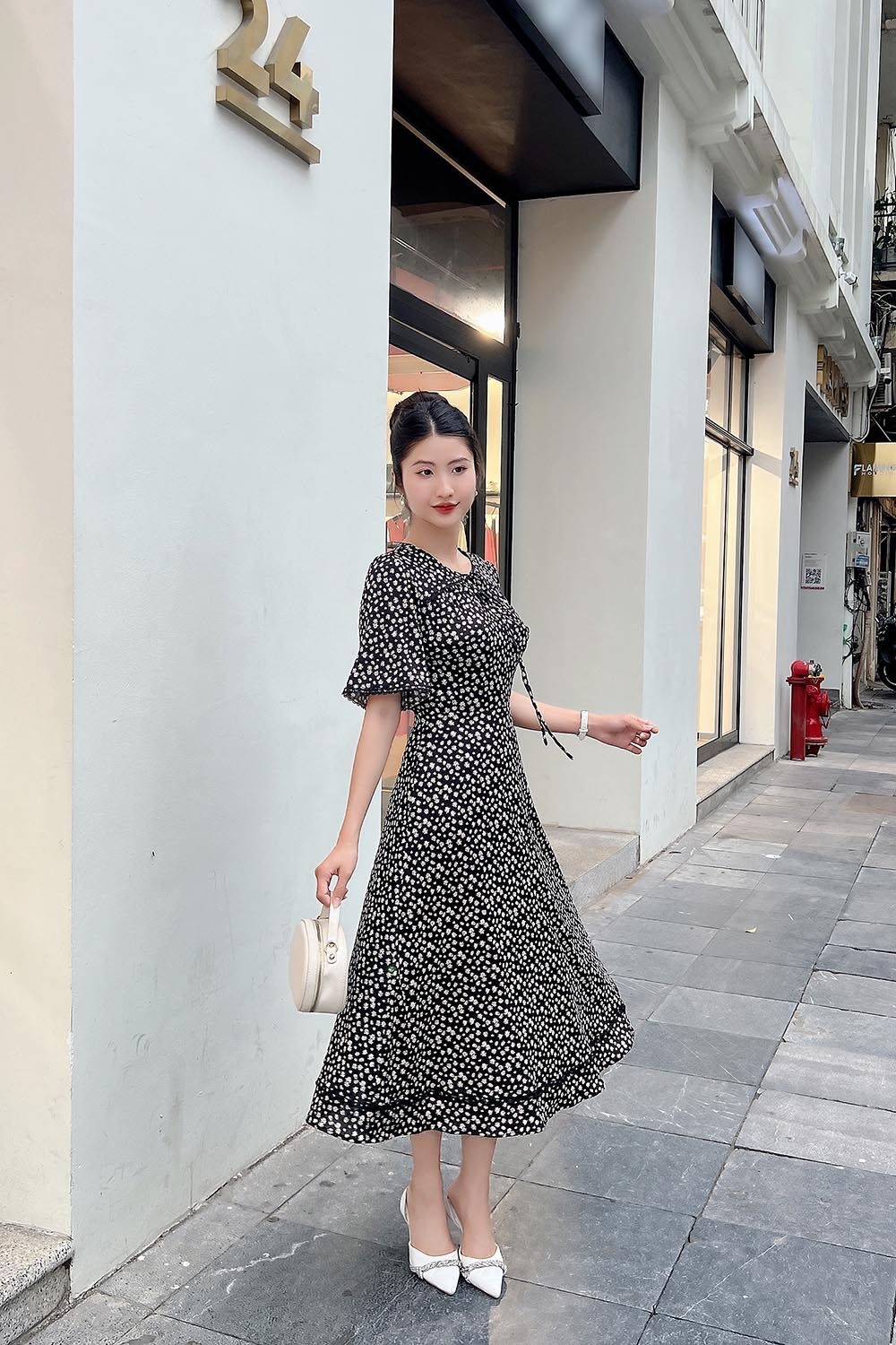 Đầm thun đen hoa công sở dáng xòe