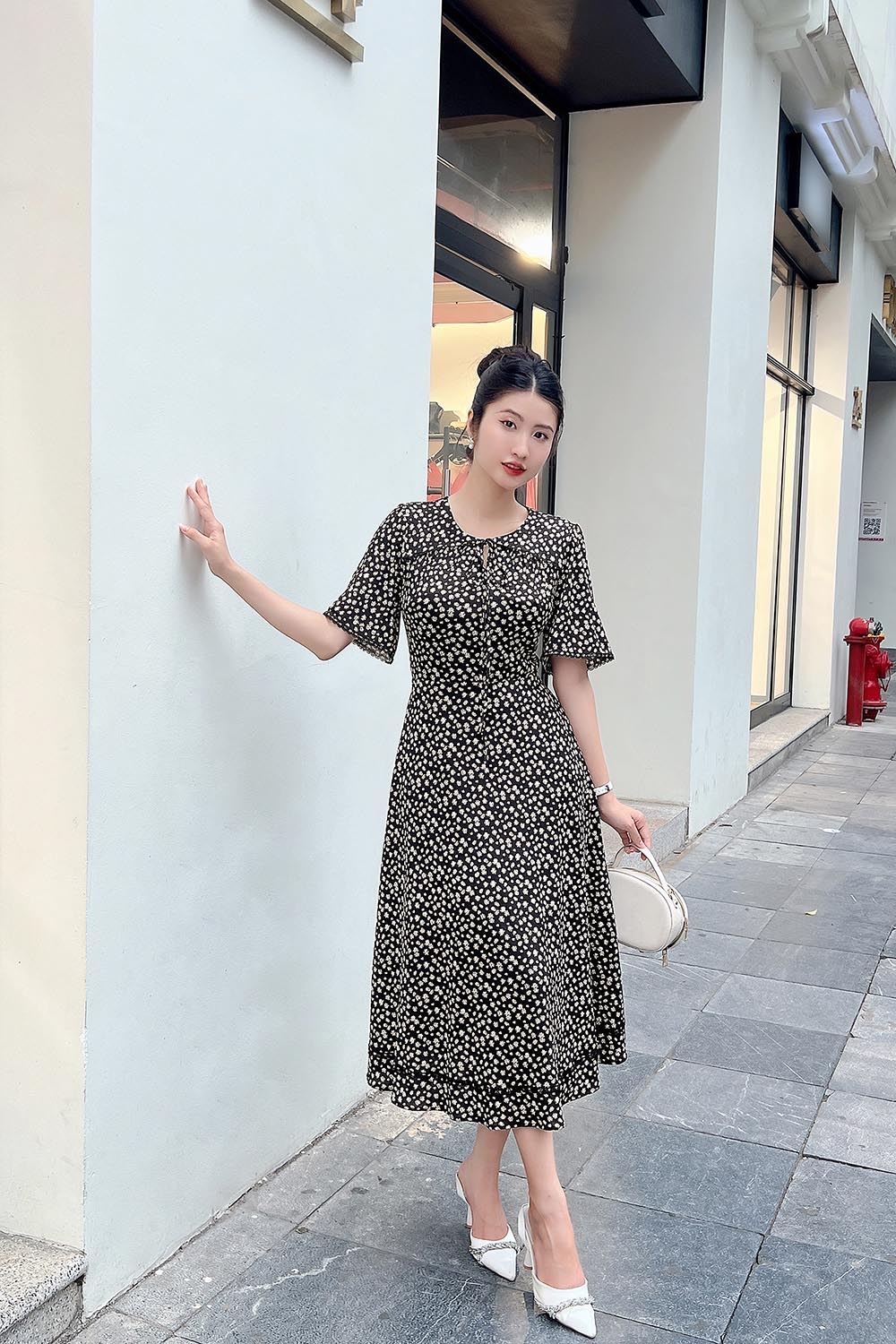 Đầm thun đen hoa công sở dáng xòe