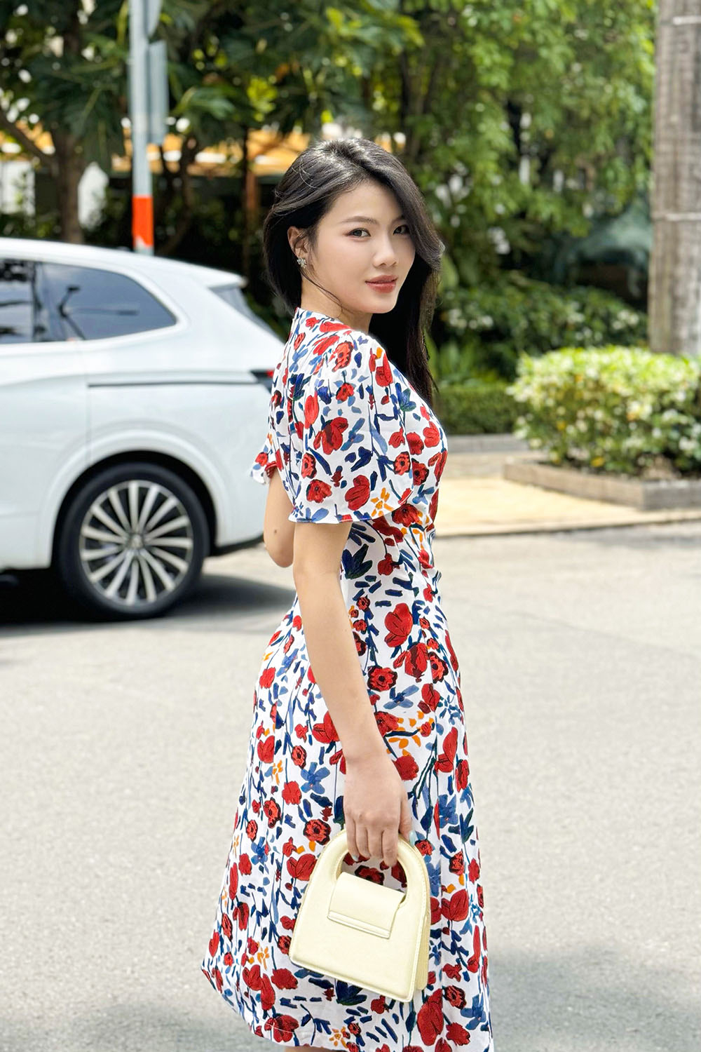 Đầm wrap dress họa tiết hoa eo thắt nơ