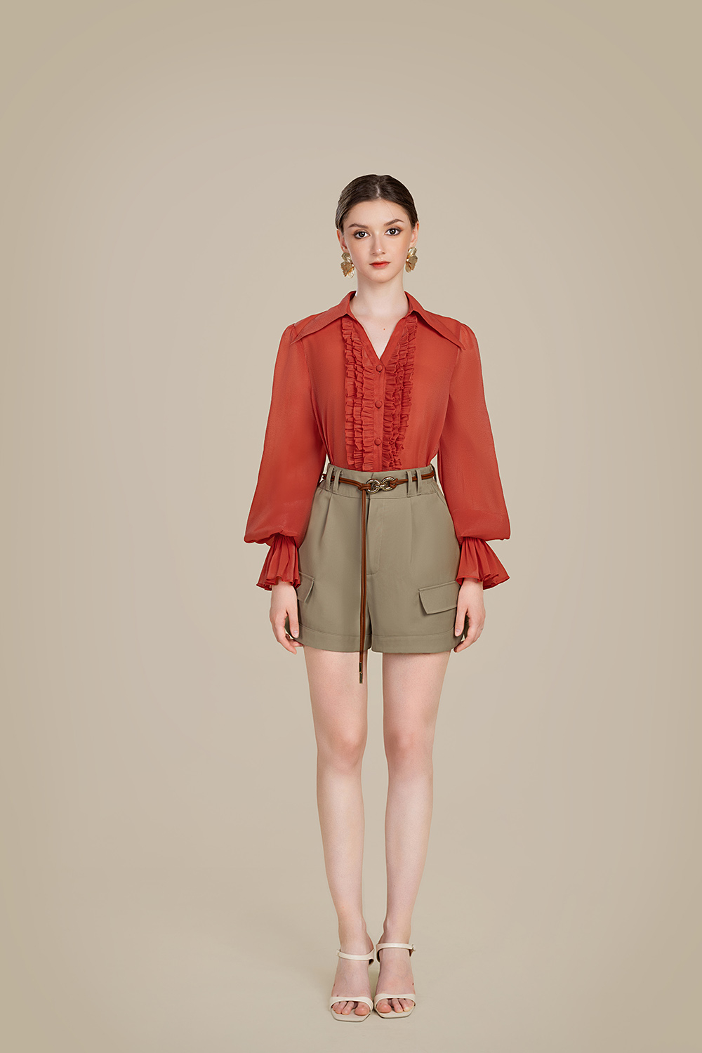 Áo sơ mi nữ màu cam phối bèo tay dài