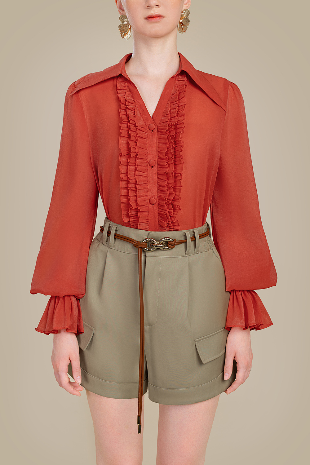 Áo sơ mi nữ màu cam phối bèo tay dài