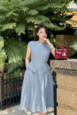 Đầm peplum công sở dáng xòe cổ V