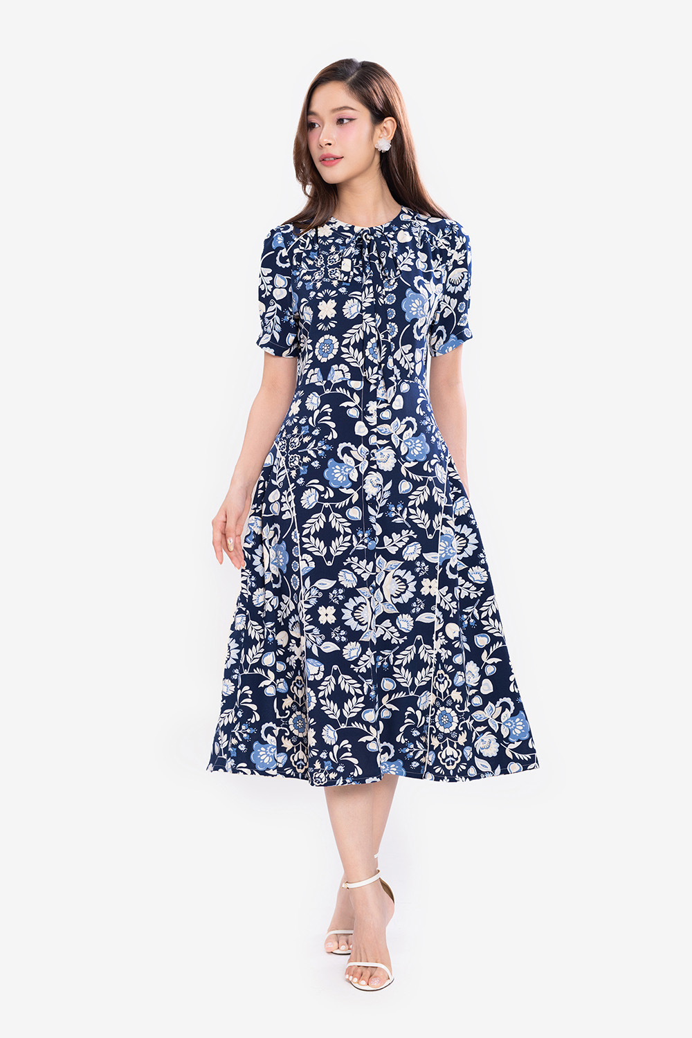 Đầm hoa chữ A tay phồng cổ phối nơ