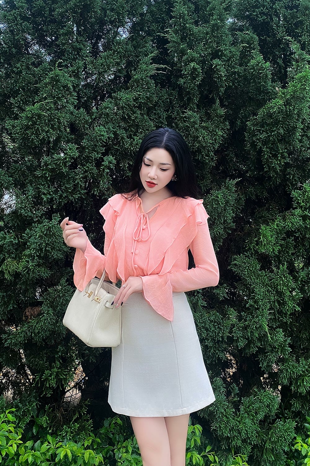 Áo kiểu nữ màu hồng tay dài phối bèo